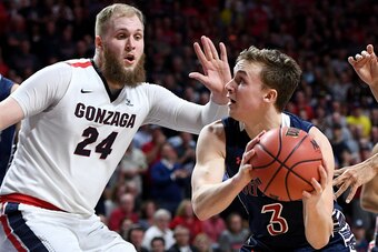 LAS VEGAS, NV - MARCH 07:  Emmett Naar #3 of the Saint Mary's Gaels drives against Przemek Karnowski #24 of the Gonzaga Bulldogs during the championship game of the West Coast Conference Basketball Tournament at the Orleans Arena on March 7, 2017 in Las V