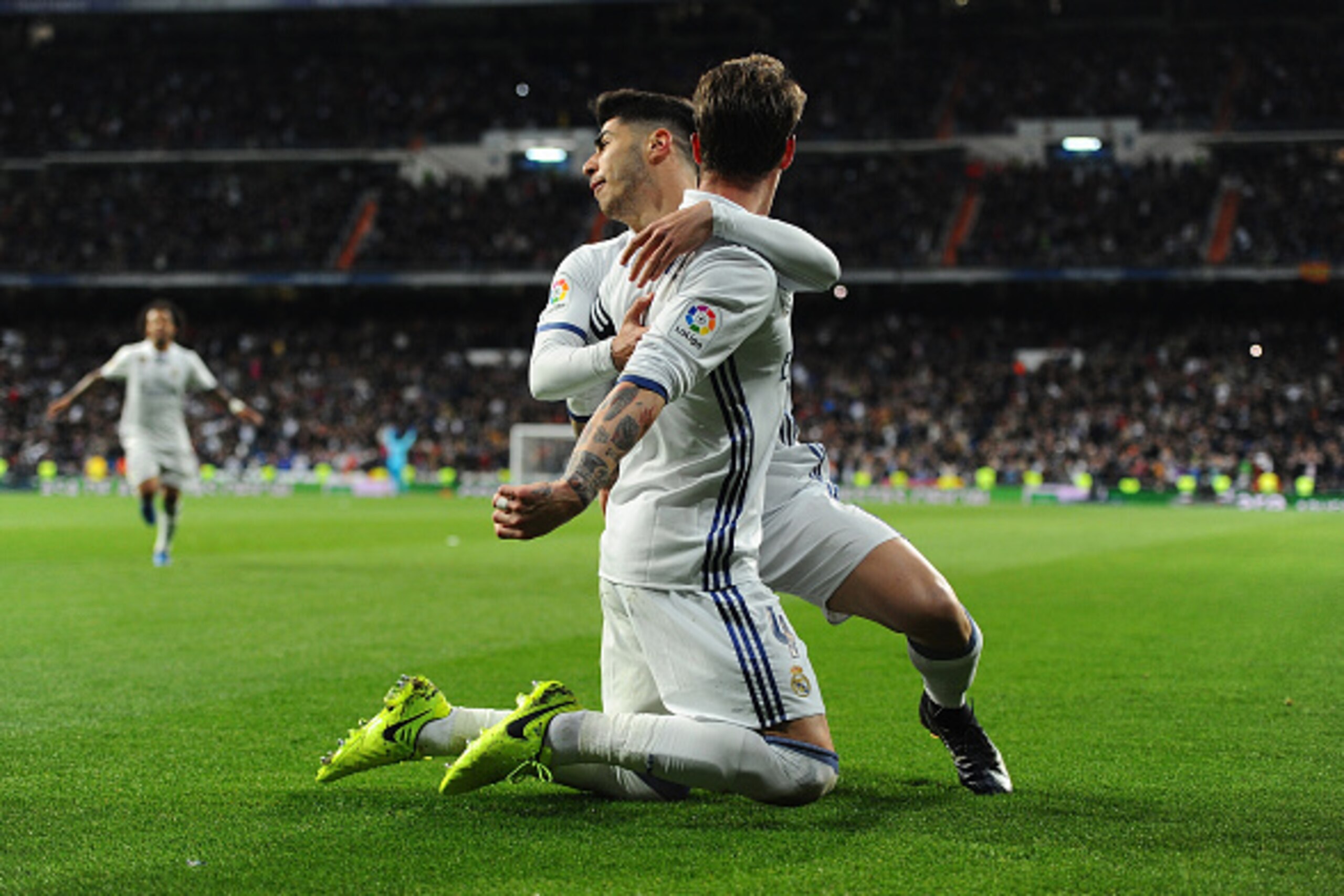 MADRID, SPAIN - MARCH 12:  Sergio Ramos of Real Madrid celebrates with Marco Asensio after scoring Real's 2nd goal during the La Liga match between Real Madrid CF and Real Betis Balompie at Estadio Santiago Bernabeu on March 12, 2017 in Madrid, Spain.  (P
