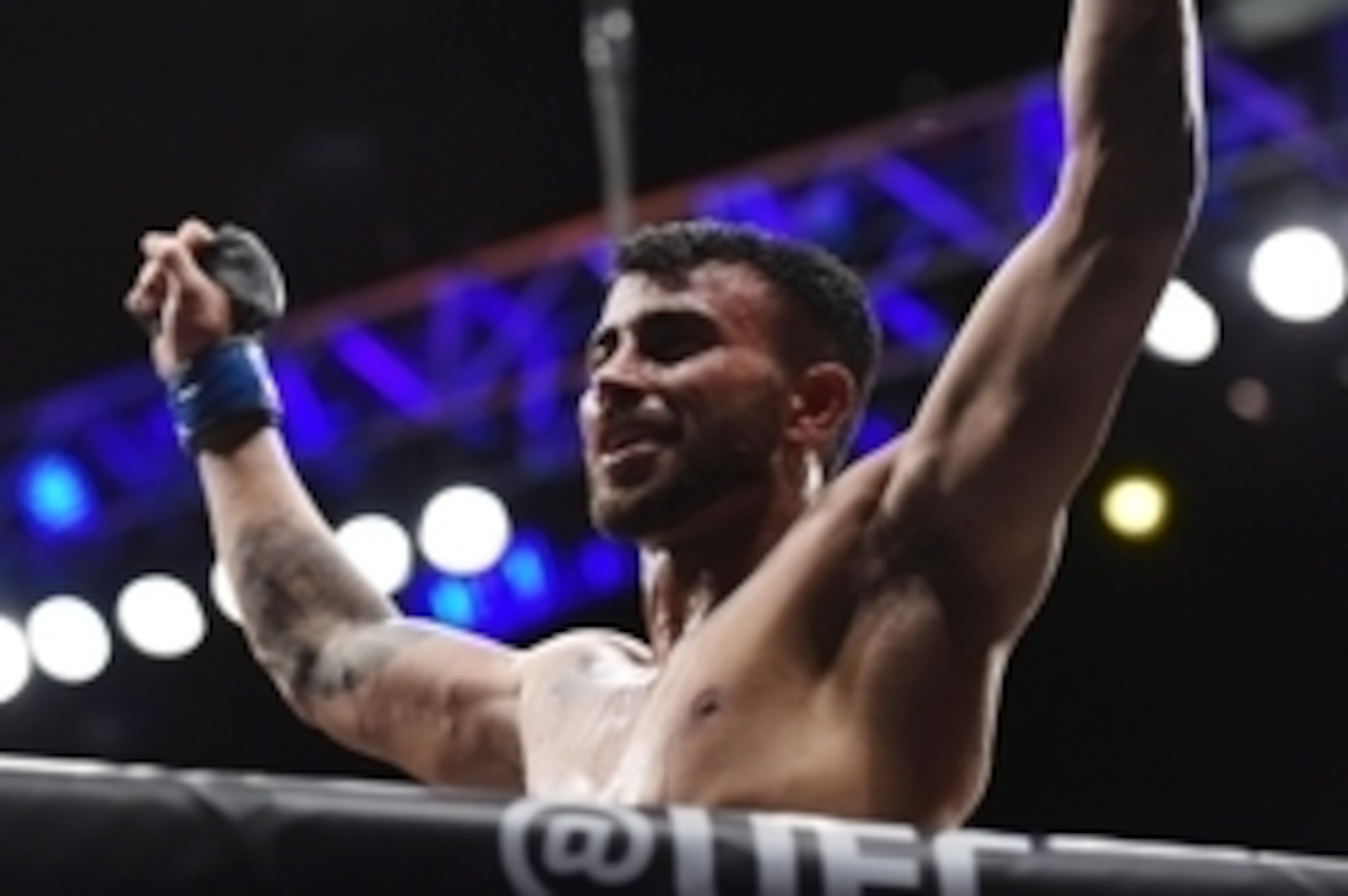 Feb 27, 2016; London, United Kingdom; Makwan Amirkhani (blue gloves) reacts after his fight against Mike Wilkinson during UFC Fight Night at O2 Arena. Mandatory Credit: Per Haljestam-USA TODAY Sports
