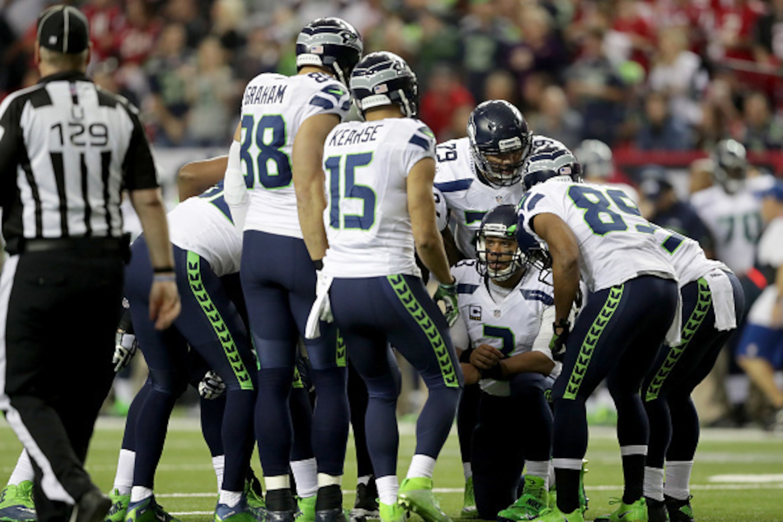 ATLANTA, GA - JANUARY 14:    Russell Wilson #3 of the Seattle Seahawks in the huddle against the Atlanta Falcons at the Georgia Dome on January 14, 2017 in Atlanta, Georgia.  (Photo by Streeter Lecka/Getty Images)