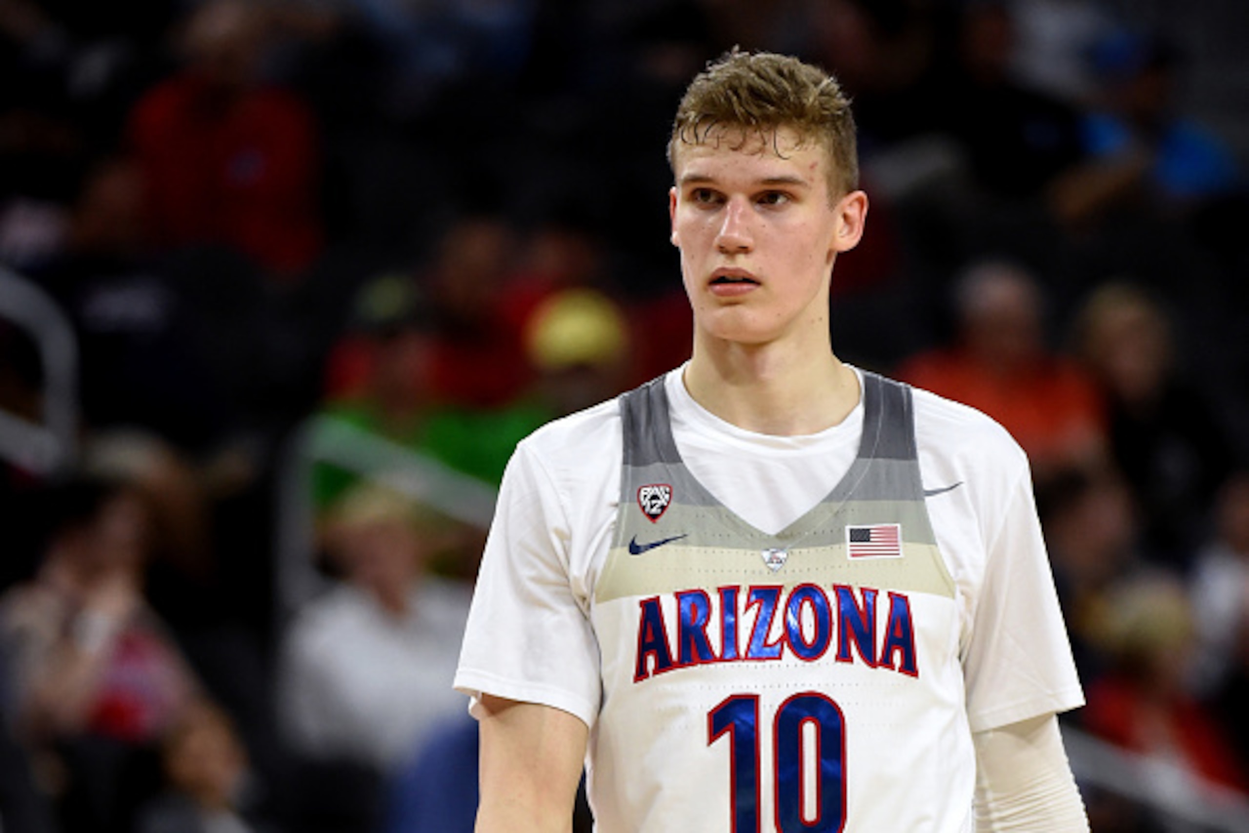 LAS VEGAS, NV - MARCH 10:  Lauri Markkanen #10 of the Arizona Wildcats stands on the court during a semifinal game of the Pac-12 Basketball Tournament against the UCLA Bruins at T-Mobile Arena on March 10, 2017 in Las Vegas, Nevada. Arizona won 86-75.  (P
