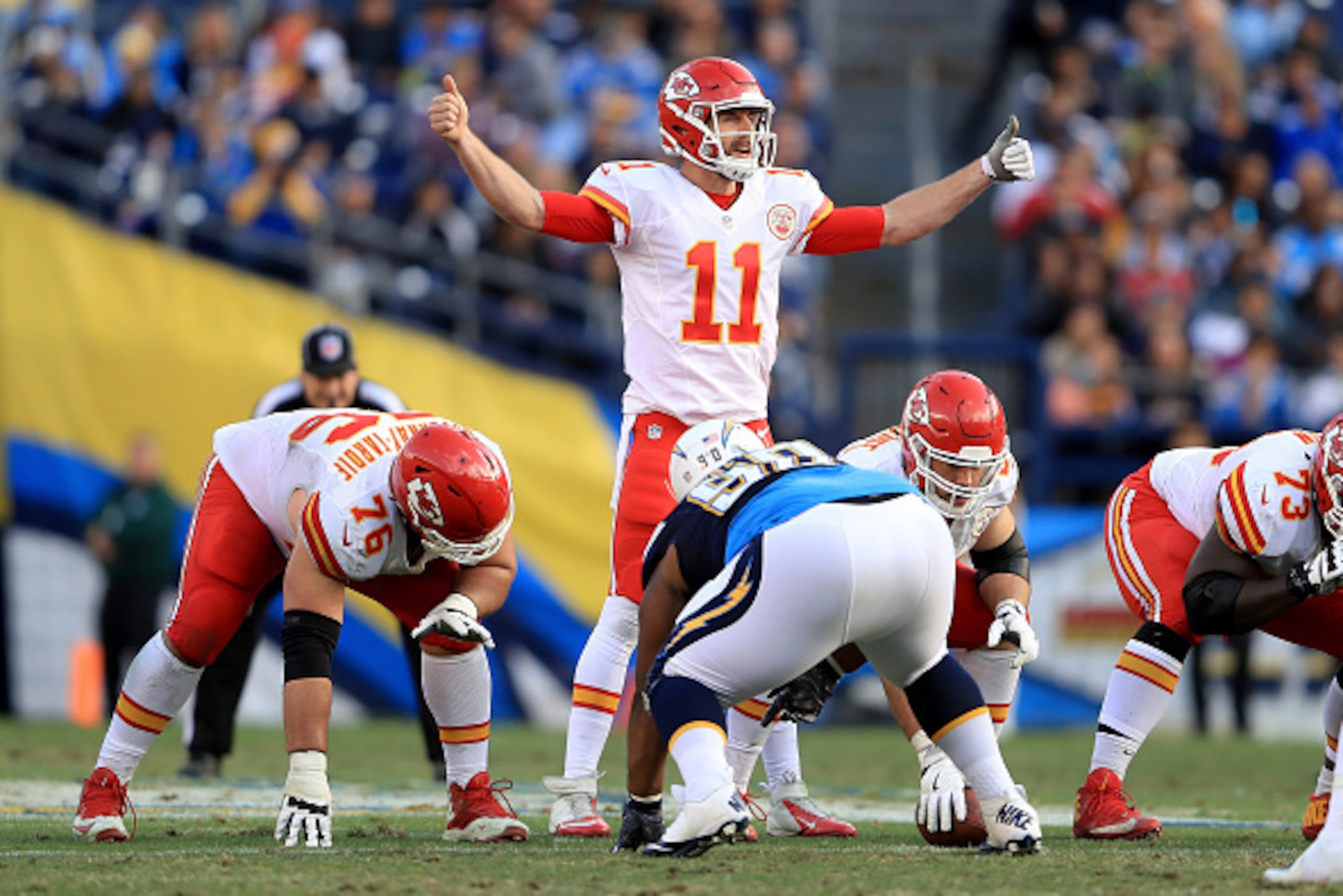 SAN DIEGO, CA - JANUARY 01:   Alex Smith #11 of the Kansas City Chiefs calls a play at the line of scrimmage during the second half of a game against the San Diego Chargers at Qualcomm Stadium on January 1, 2017 in San Diego, California.  (Photo by Sean M