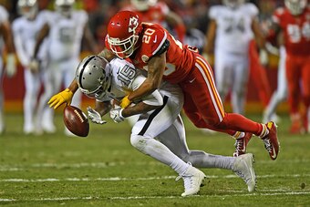 KANSAS CITY, MO - DECEMBER 08:  Defensive back Steven Nelson #20 of the Kansas City Chiefs brakes up a pass intended for wide receiver Michael Crabtree #15 of the Oakland Raiders during the second half on December 8, 2016 at Arrowhead Stadium in Kansas Ci