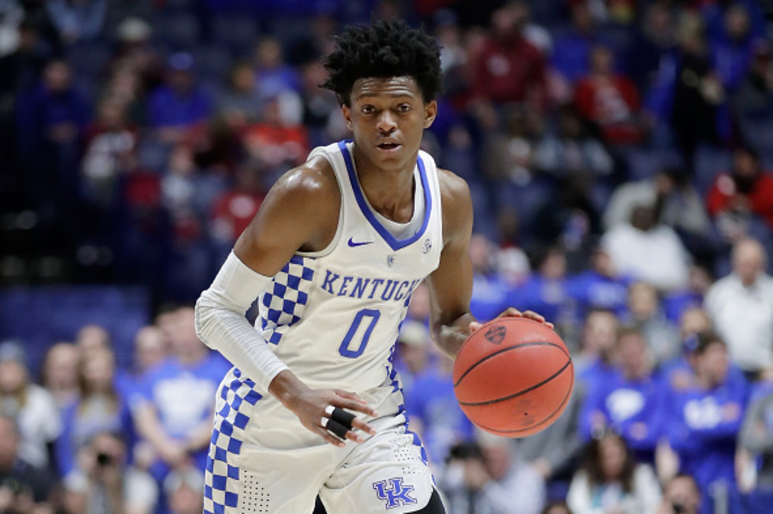 NASHVILLE, TN - MARCH 11:  De'Aaron Fox #0 of the Kentucky Wildcats dribbles the ball against the Alabama Crimson Tide during the semifinals of the SEC Basketball Tournament at Bridgestone Arena on March 11, 2017 in Nashville, Tennessee.  (Photo by Andy L