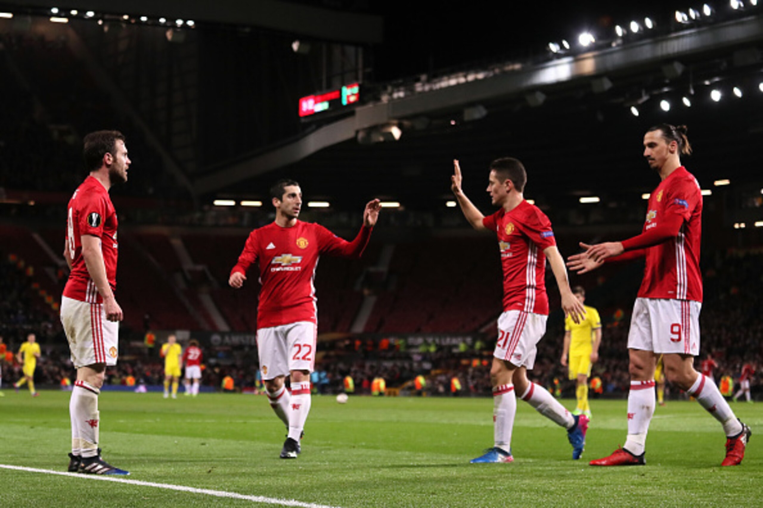 MANCHESTER, ENGLAND - MARCH 16:  Juan Mata (l), Henrikh Mkhitaryan, Ander Herrera and Zlatan Ibrahimovic of Manchester United celebrate the first goal which made the score 1-0  during the UEFA Europa League Round of 16 second leg match between Manchester 