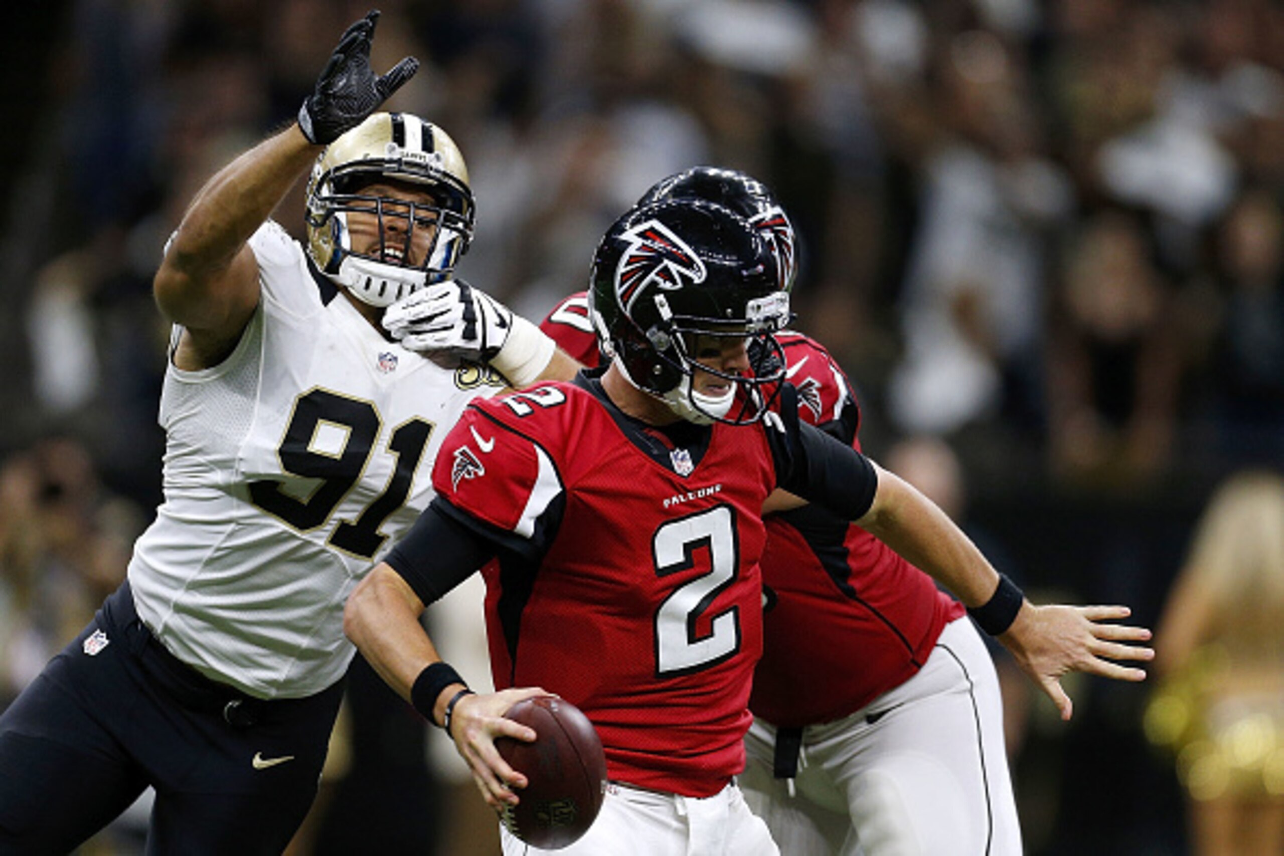 NEW ORLEANS, LA - SEPTEMBER 26: Matt Ryan #2 of the Atlanta Falcons scrambles as Kasim Edebali #91 of the New Orleans Saints pursues during the second half of a game at the Mercedes-Benz Superdome on September 26, 2016 in New Orleans, Louisiana.  (Photo b