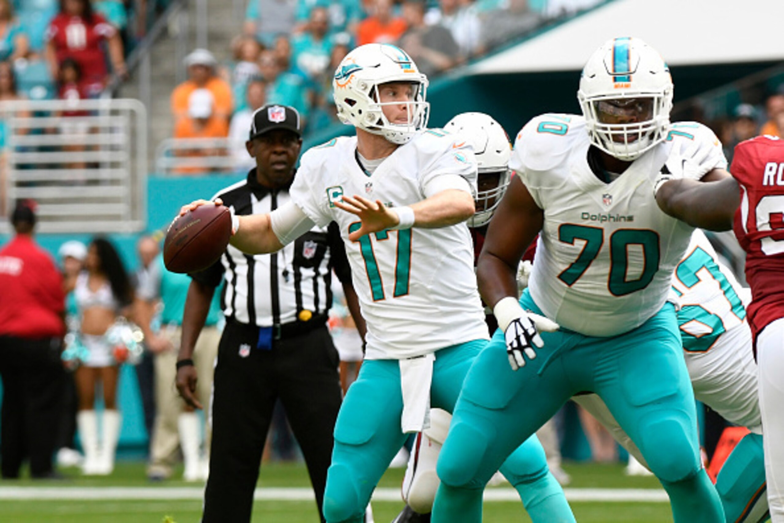 MIAMI GARDENS, FL - DECEMBER 11: Ryan Tannehill #17 of the Miami Dolphins throws a touchdown in the 1st quarter against the Arizona Cardinals at Hard Rock Stadium on December 11, 2016 in Miami Gardens, Florida. (Photo by Eric Espada/Getty Images) MIAMI GARDENS, FL - DECEMBER 11: Ryan Tannehill #17 of the Miami Dolphins throws a touchdown in the 1st quarter against the Arizona Cardinals at Hard Rock Stadium on December 11, 2016 in Miami Gardens, Florida. (Photo by Eric Espada/Getty Images)