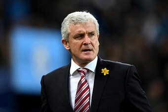 MANCHESTER, ENGLAND - MARCH 08:  Mark Hughes, Manager of Stoke City looks on during the Premier League match between Manchester City and Stoke City at Etihad Stadium on March 8, 2017 in Manchester, England.  (Photo by Shaun Botterill/Getty Images)