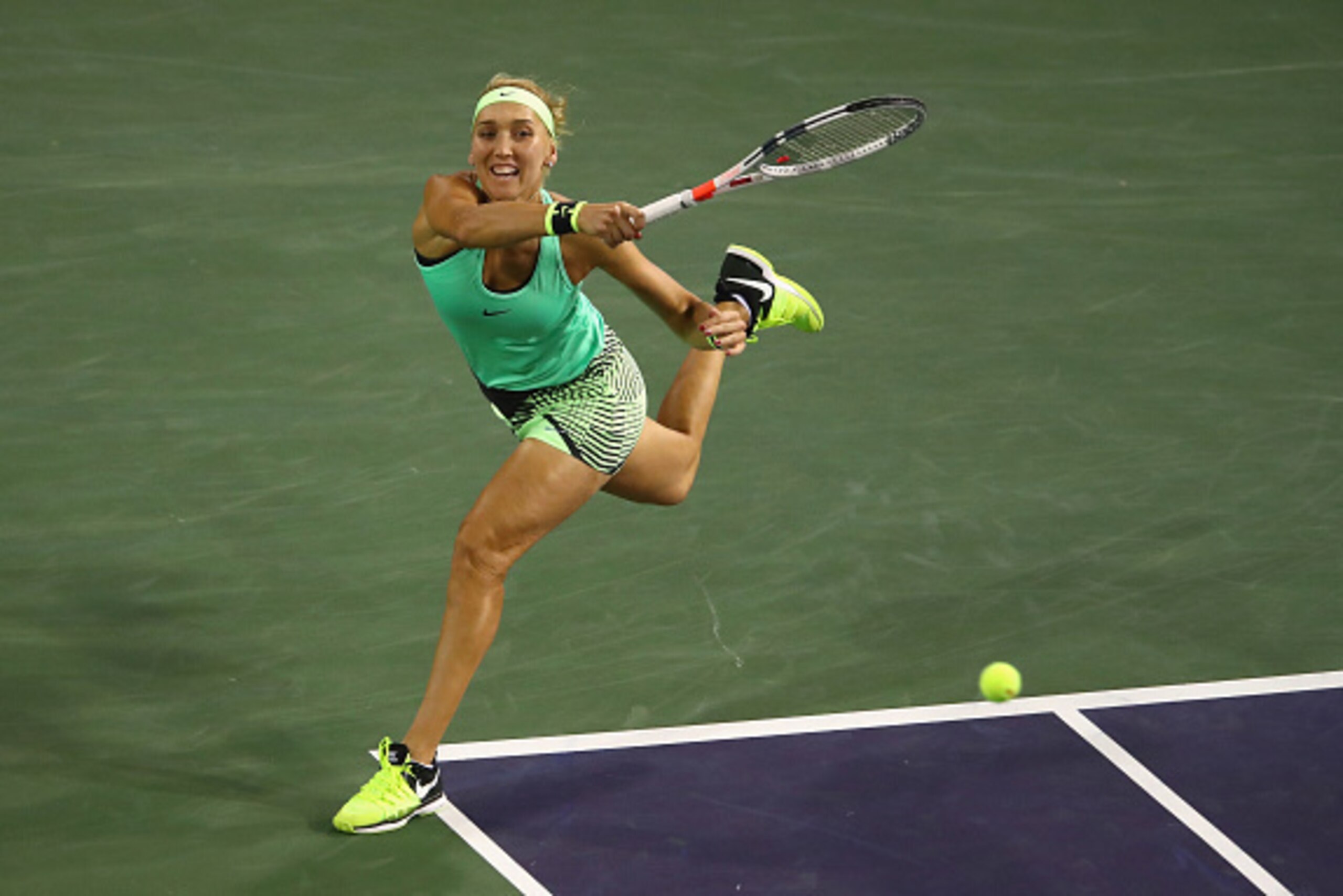 INDIAN WELLS, CA - MARCH 17:  Elena Vesnina of Russia plays a forehand against Kristina Mladenovic of France in their semi final match during day twelve of the BNP Paribas Open at Indian Wells Tennis Garden on March 17, 2017 in Indian Wells, California.  