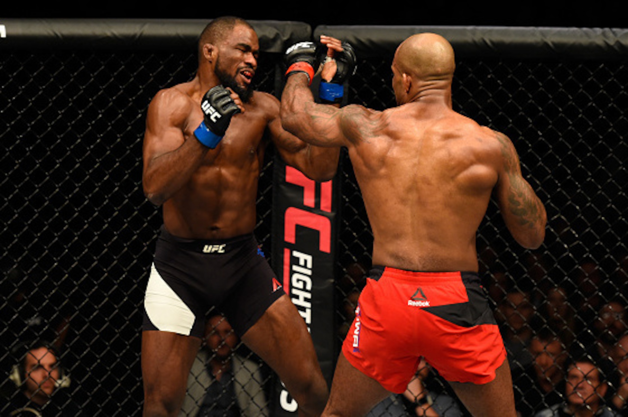 LONDON, ENGLAND - MARCH 18:  (R-L) Jimi Manuwa of England punches Corey Anderson in their light heavyweight fight during the UFC Fight Night event at The O2 arena on March 18, 2017 in London, England. (Photo by Josh Hedges/Zuffa LLC/Zuffa LLC via Getty Im