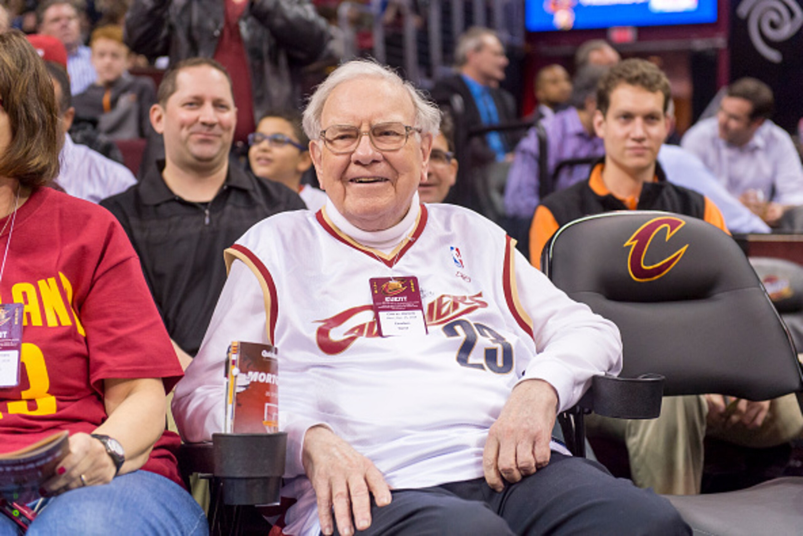 CLEVELAND, OH - DECEMBER 15: Warren Buffet sits court side prior to the game between the Charlotte Hornets and the Cleveland Cavaliers during the first half at Quicken Loans Arena on December 15, 2014 in Cleveland, Ohio. NOTE TO USER: User expressly ackno