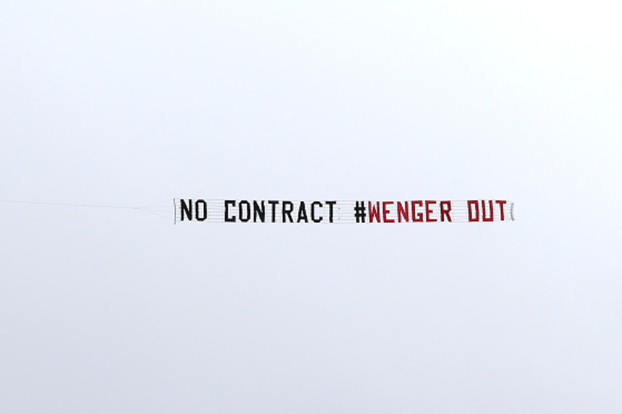 WEST BROMWICH, ENGLAND - MARCH 18:  A plane is seen flying over the stadium with a message for Arsene Wenger (not pictured) during the Premier League match between West Bromwich Albion and Arsenal at The Hawthorns on March 18, 2017 in West Bromwich, Engla