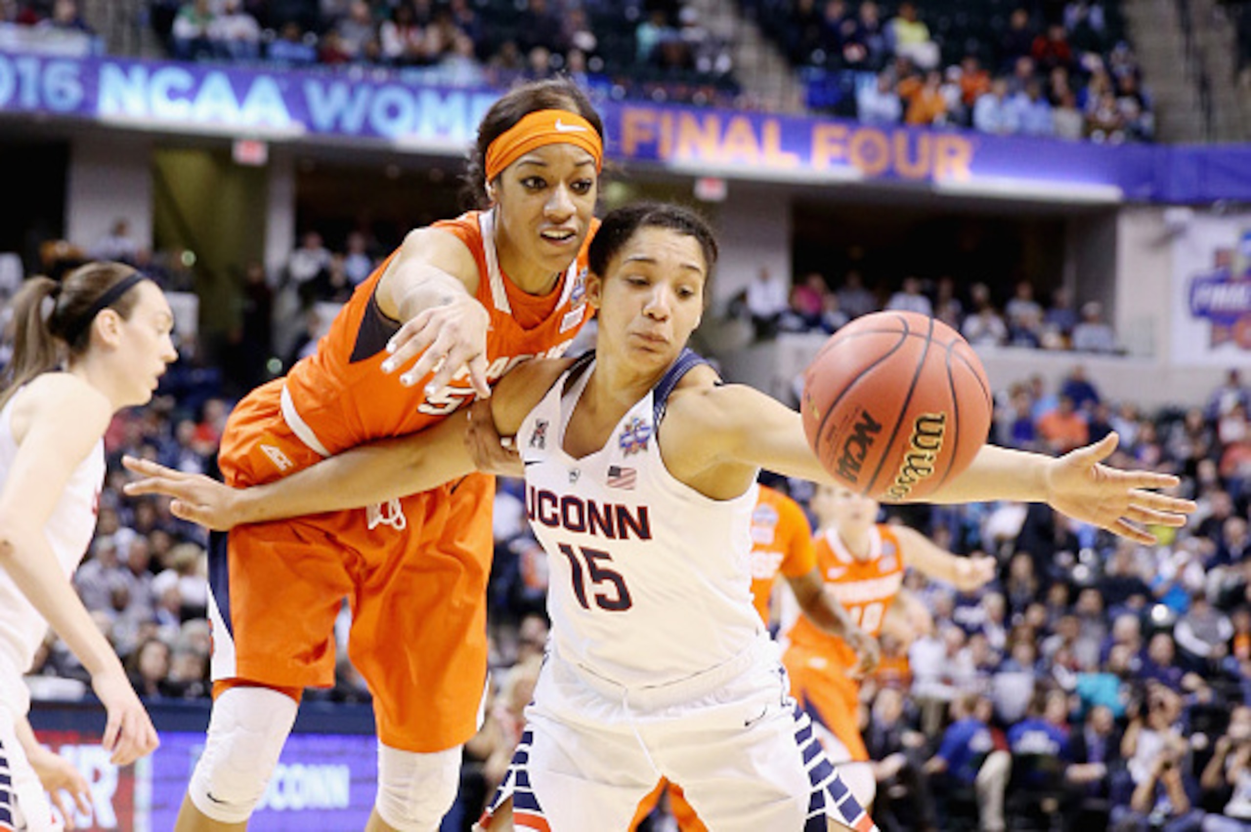 INDIANAPOLIS, IN - APRIL 05: Briana Day #50 of the Syracuse Orange battles against Gabby Williams #15 of the Connecticut Huskies in the third quarter during the championship game of the 2016 NCAA Women's Final Four Basketball Championship at Bankers Life INDIANAPOLIS, IN - APRIL 05: Briana Day #50 of the Syracuse Orange battles against Gabby Williams #15 of the Connecticut Huskies in the third quarter during the championship game of the 2016 NCAA Women's Final Four Basketball Championship at Bankers Life