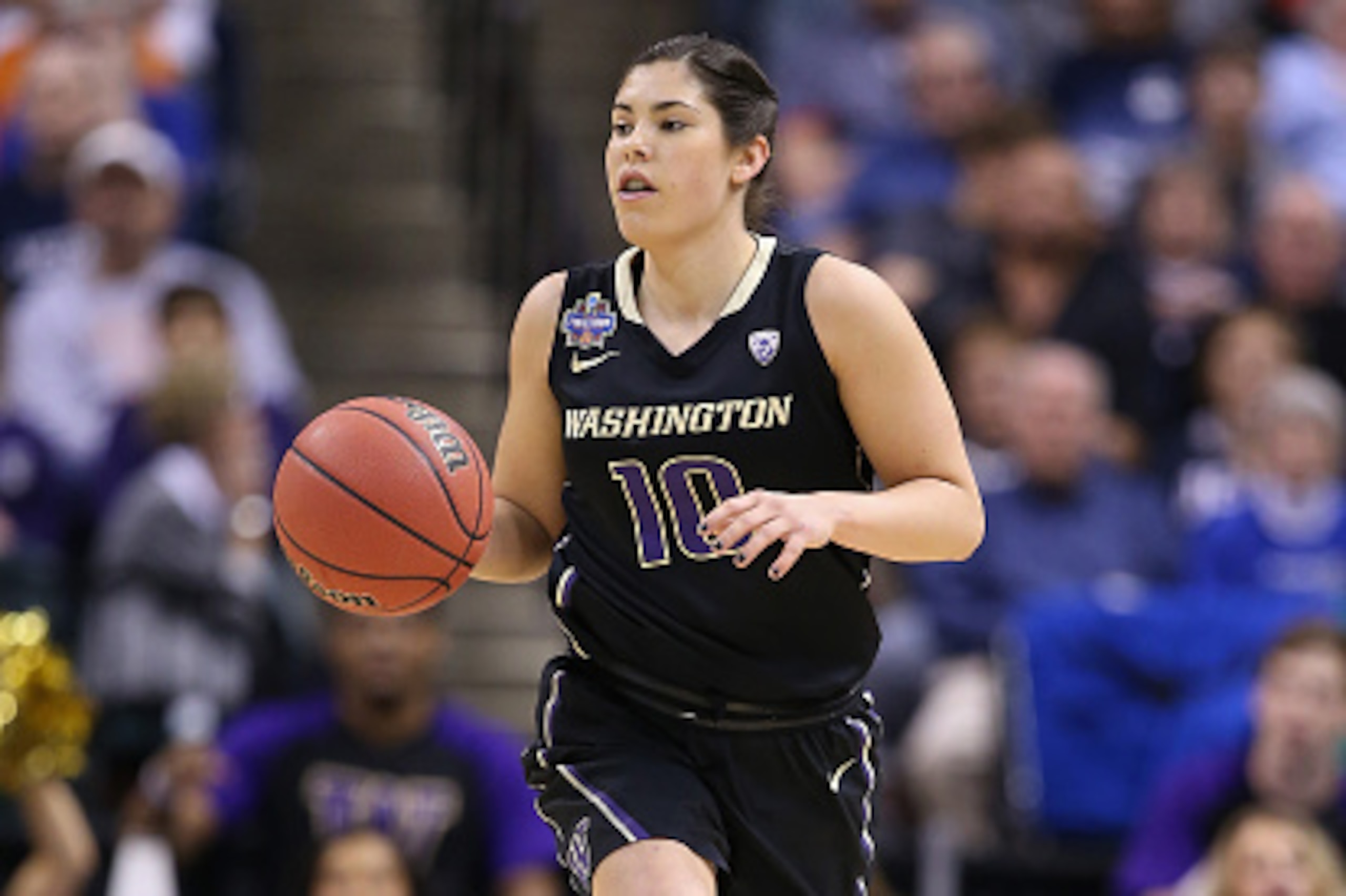 INDIANAPOLIS, IN - APRIL 03: Kelsey Plum #10 of the Washington Huskies brings the ball upcourt in the first quarter against the Syracuse Orange during the semifinals of the 2016 NCAA Women's Final Four Basketball Championship at Bankers Life Fieldhouse o INDIANAPOLIS, IN - APRIL 03: Kelsey Plum #10 of the Washington Huskies brings the ball upcourt in the first quarter against the Syracuse Orange during the semifinals of the 2016 NCAA Women's Final Four Basketball Championship at Bankers Life Fieldhouse o