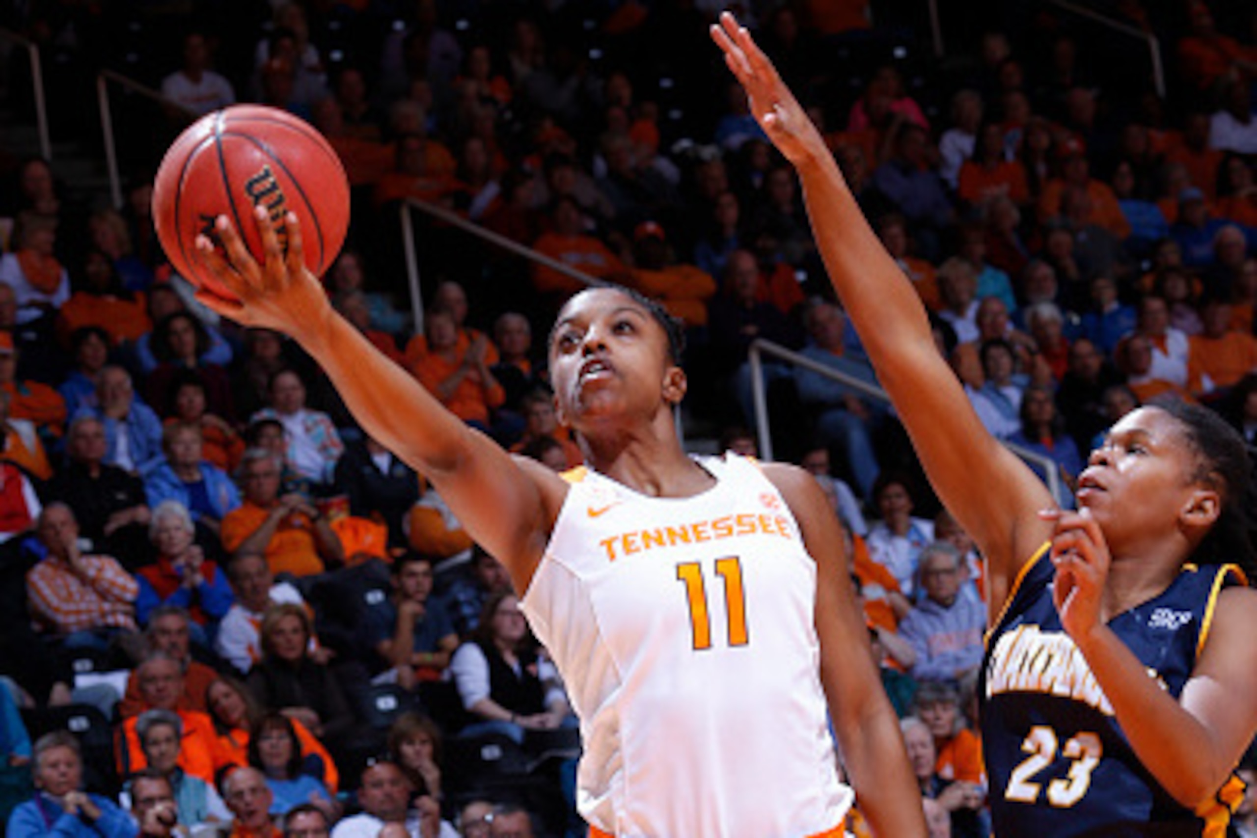 KNOXVILLE, TN - NOVEMBER 23: Diamond DeShields #11 of the Tennessee Lady Volunteers shoots against Moses Johnson #23 of the University of Tennessee Chattanooga Mocs in a game at Thompson-Boling Arena on November 23, 2015 in Knoxville, Tennessee. (Photo KNOXVILLE, TN - NOVEMBER 23: Diamond DeShields #11 of the Tennessee Lady Volunteers shoots against Moses Johnson #23 of the University of Tennessee Chattanooga Mocs in a game at Thompson-Boling Arena on November 23, 2015 in Knoxville, Tennessee. (Photo