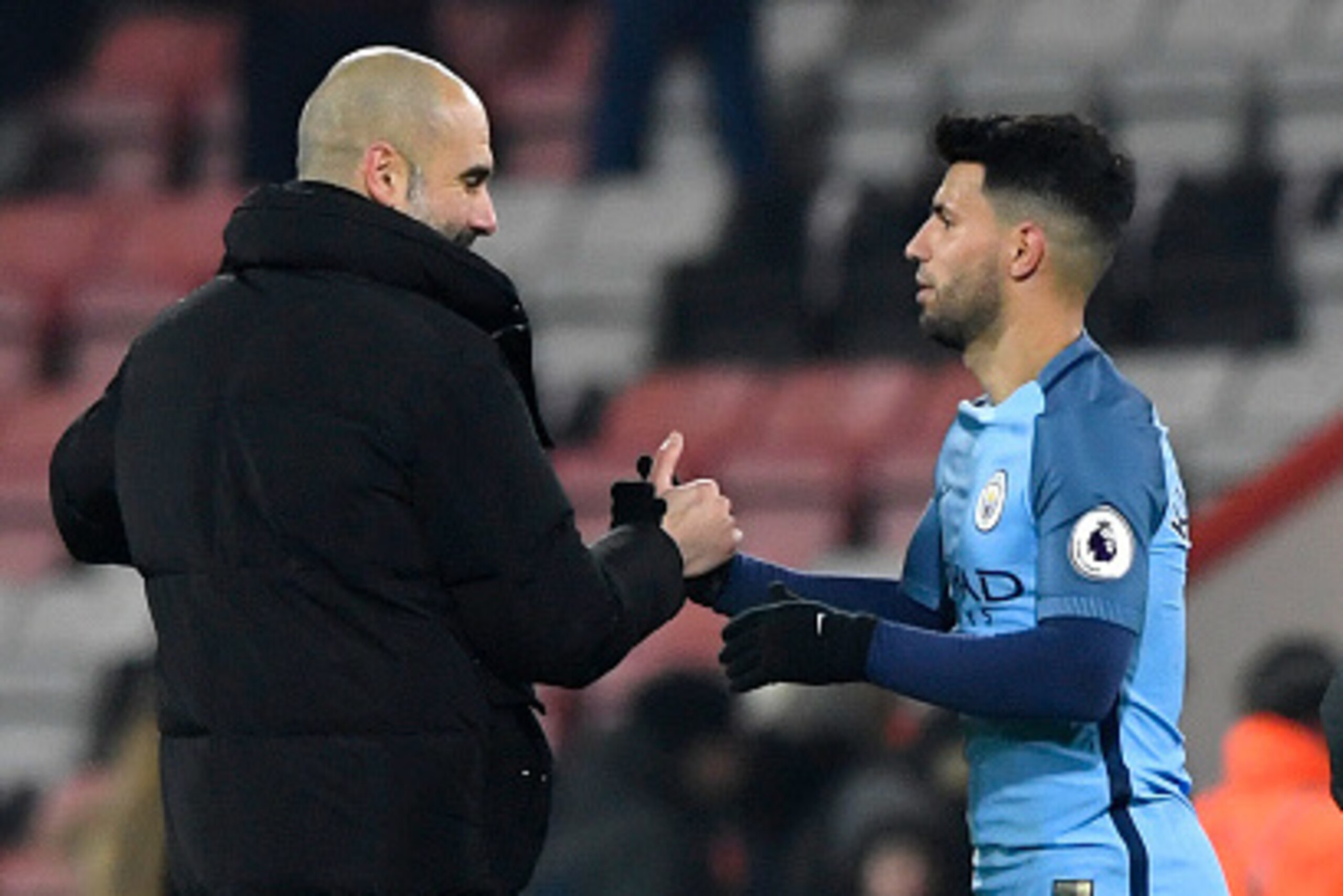 BOURNEMOUTH, ENGLAND - FEBRUARY 13:  Pep Guardiola, manager of Manchester City shakes hands with Sergio Aguero of Manchester City after the Premier League match between AFC Bournemouth and Manchester City at Vitality Stadium on February 13, 2017 in Bourne