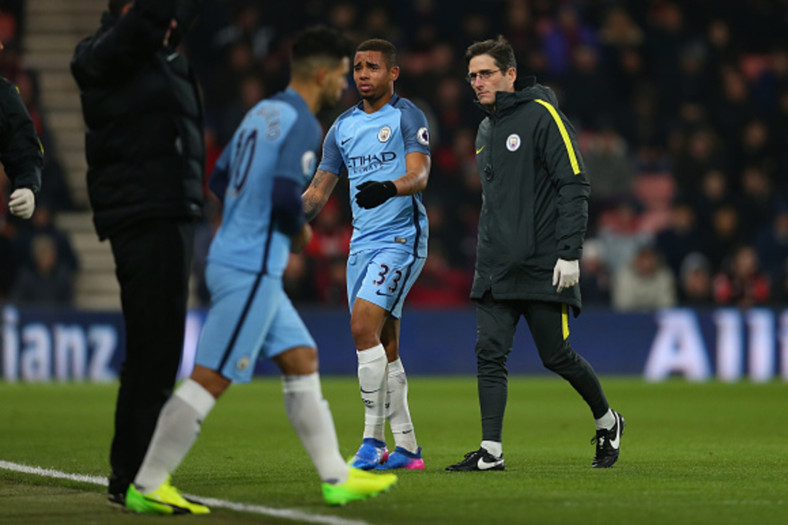 BOURNEMOUTH, ENGLAND - FEBRUARY 13: An injured Gabriel Jesus of Manchester City leaves the pitch as Sergio Aguero of Manchester City prepares to come on  during the Premier League match between AFC Bournemouth and Manchester City at Vitality Stadium on Fe