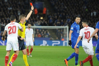 Sevilla were shocked by Leicester City in a game which saw Samir Nasri sent off.