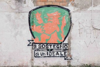 Venezia's crest painted on a wall in Venice.