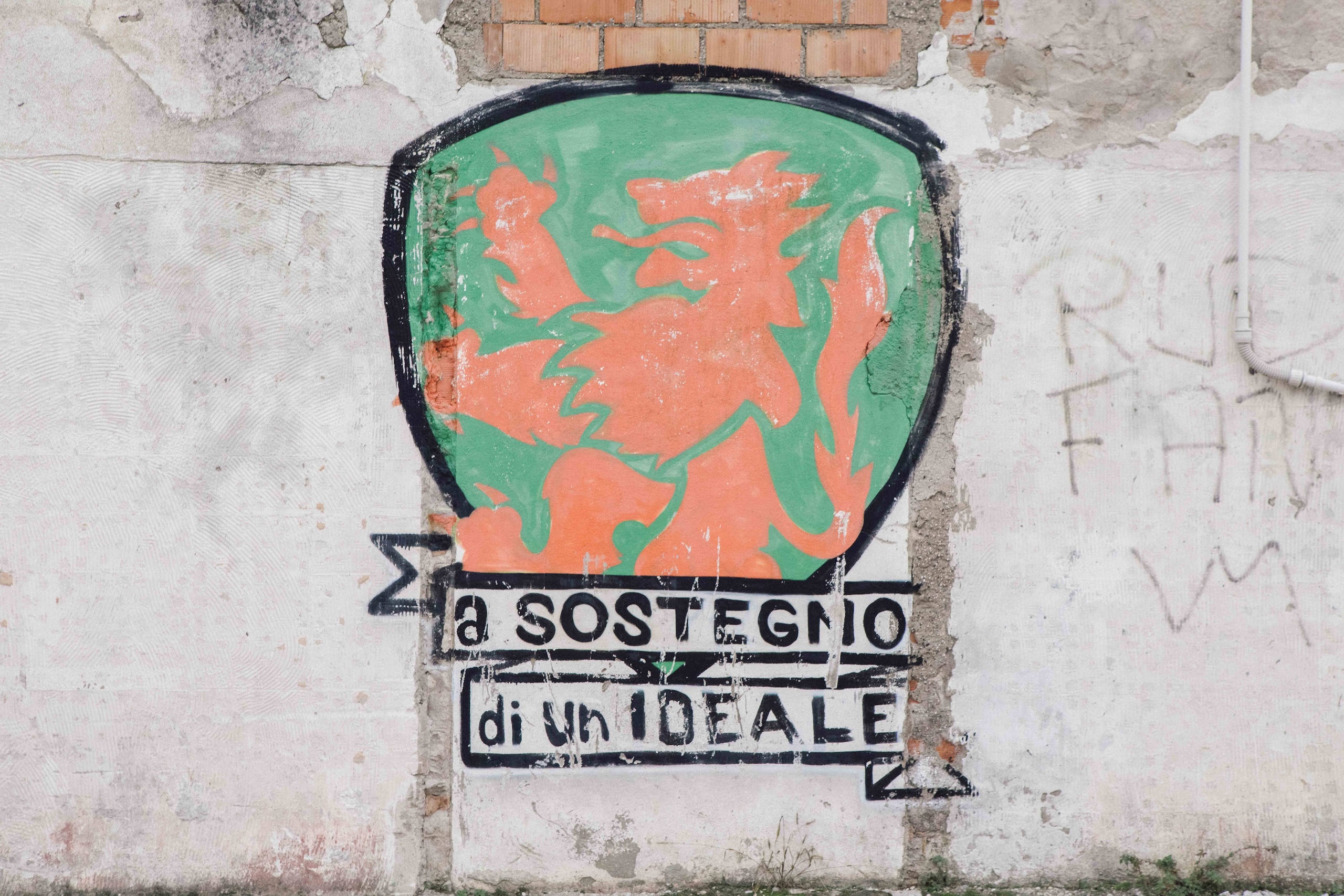 Venezia's crest painted on a wall in Venice. Venezia's crest painted on a wall in Venice.