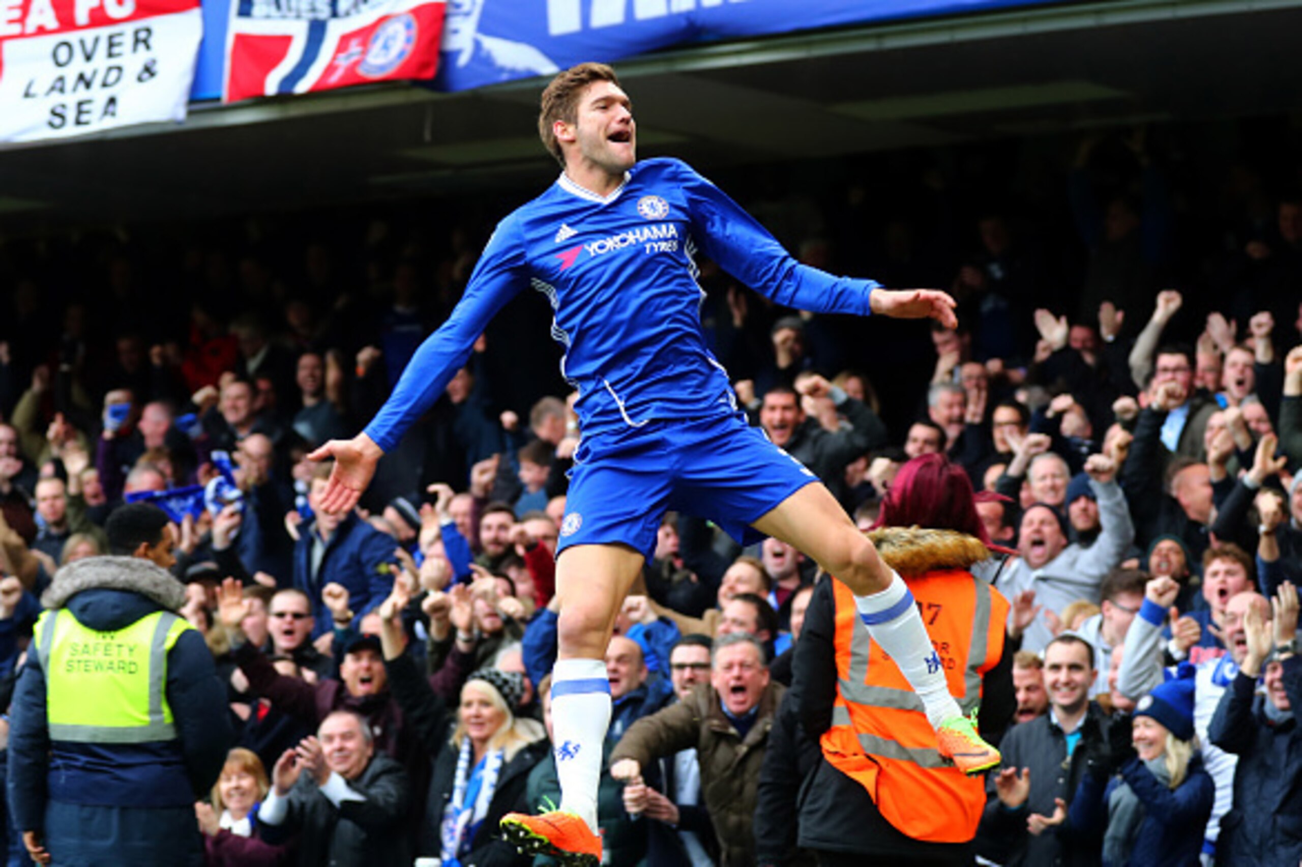 LONDON, ENGLAND - FEBRUARY 04:  Marcos Alonso of Chelsea celebrates after scoring the opening goal during the Premier League match between Chelsea and Arsenal at Stamford Bridge on February 4, 2017 in London, England.  (Photo by Clive Rose/Getty Images)