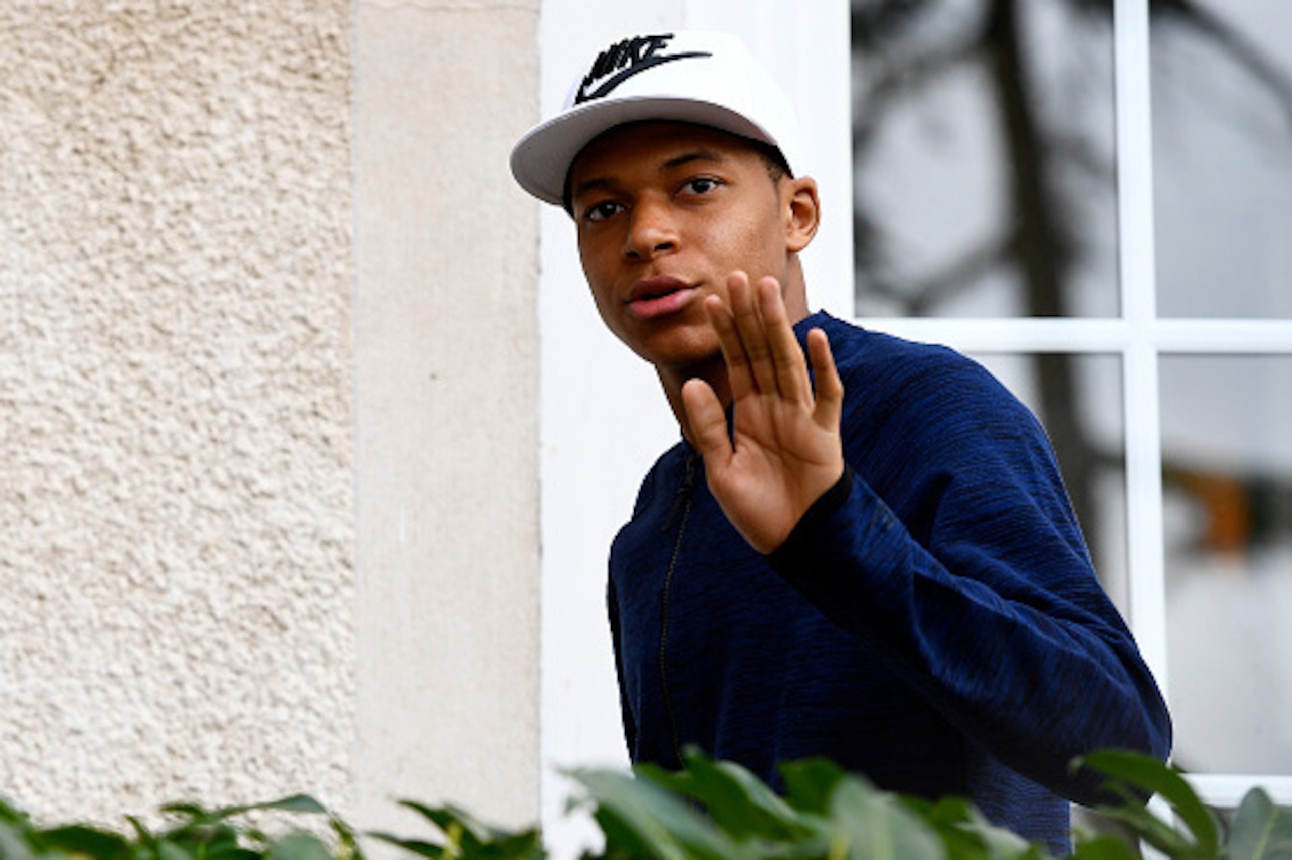 France's forward Kylian Mbappe arrives to the French national football team training base in Clairefontaine, near Paris, on March 20, 2017, as part of the team's preparation for the upcoming World Cup 2018 qualifiers.   / AFP PHOTO / FRANCK FIFE        (P