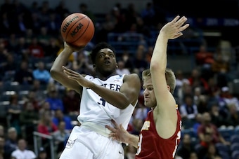 Kamar Baldwin attempts a shot against Winthrop's Bjorn Broman on March 16, 2017.
