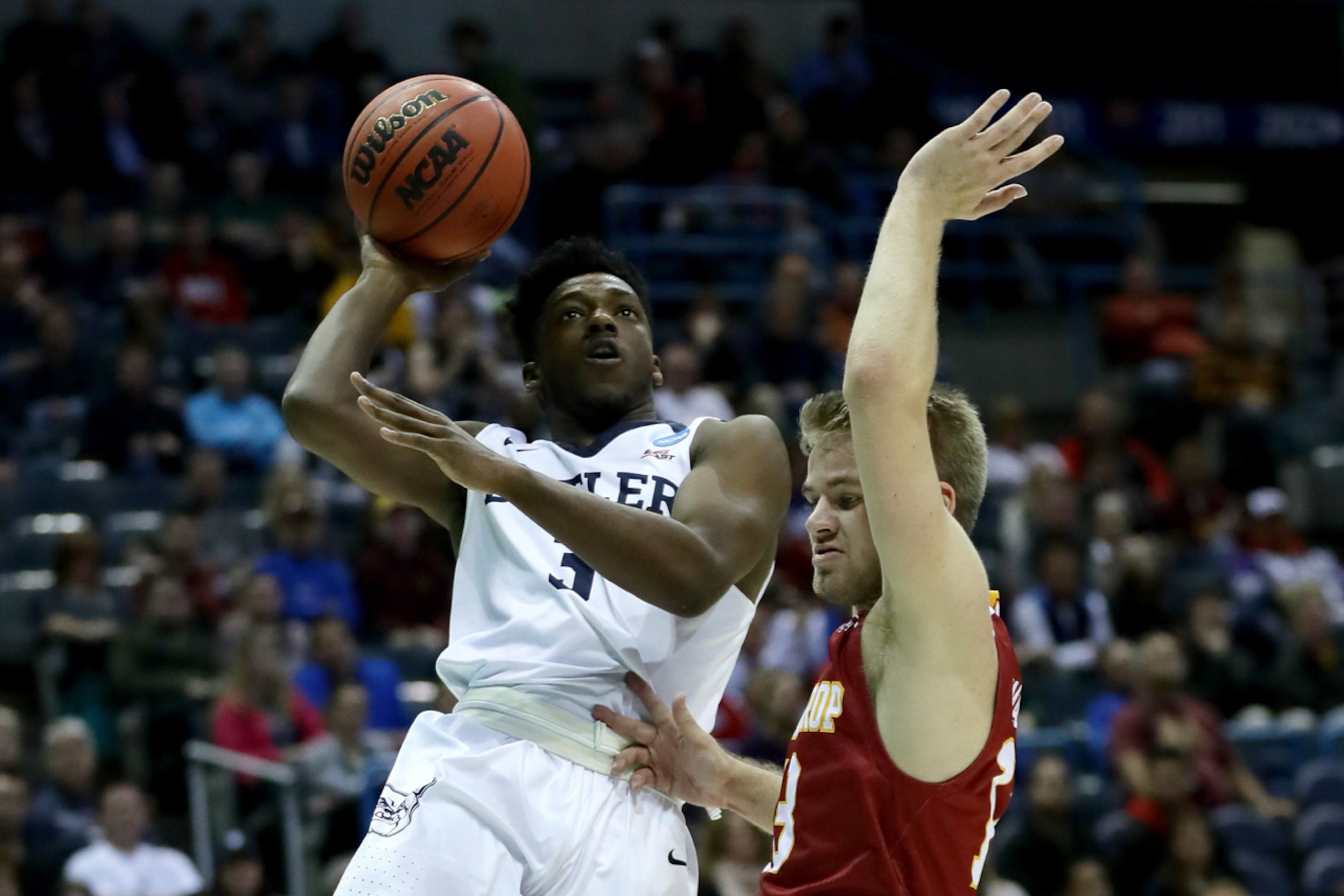 Kamar Baldwin attempts a shot against Winthrop's Bjorn Broman on March 16, 2017.