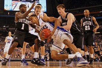 Duke's Lance Thomas is double-teamed by Butler's Shelvin Mack (1) and Gordon Hayward during the second half of the men's NCAA championship game on April 5, 2010, in Indianapolis.