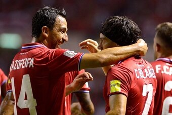 Randall Azofeifa (L) and Christian Bolanos (R) of Costa Rica celebrate a goal against Panama during their Russia 2018 FIFA World Cup Concacaf qualifiers football match at the National Stadium in San Jose, on September 6, 2016. / AFP / Ezequiel Becerra    