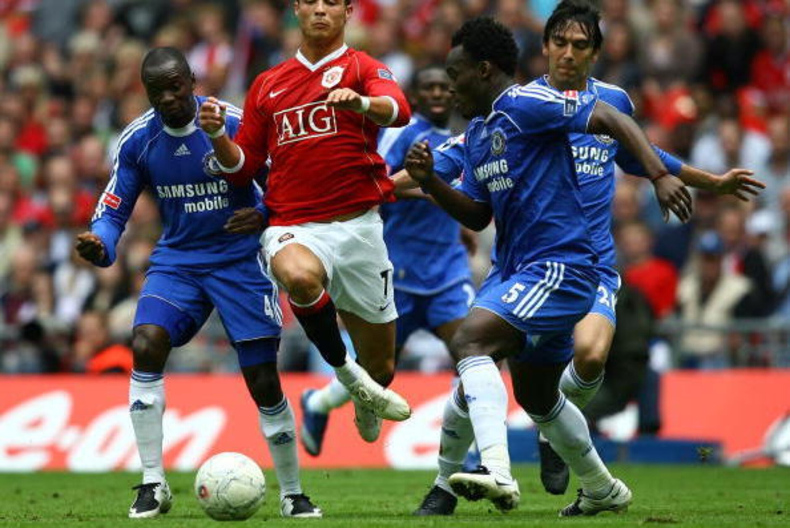 LONDON - MAY 19:  Cristiano Ronaldo of Manchester United (2L) takes on Claude Makelele, Paulo Ferreira and Michael Essien of Chelsea during the FA Cup Final match sponsored by E.ON between Manchester United and Chelsea at Wembley Stadium on May 19, 2007 i