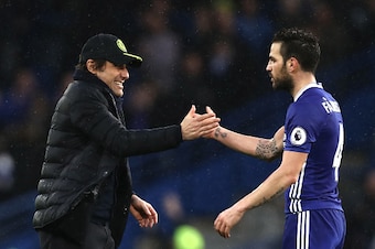 LONDON, ENGLAND - FEBRUARY 25:  Antonio Conte, Manager of Chelsea (L) and Cesc Fabregas of Chelsea (R) embrace after the Premier League match between Chelsea and Swansea City at Stamford Bridge on February 25, 2017 in London, England.  (Photo by Clive Ros