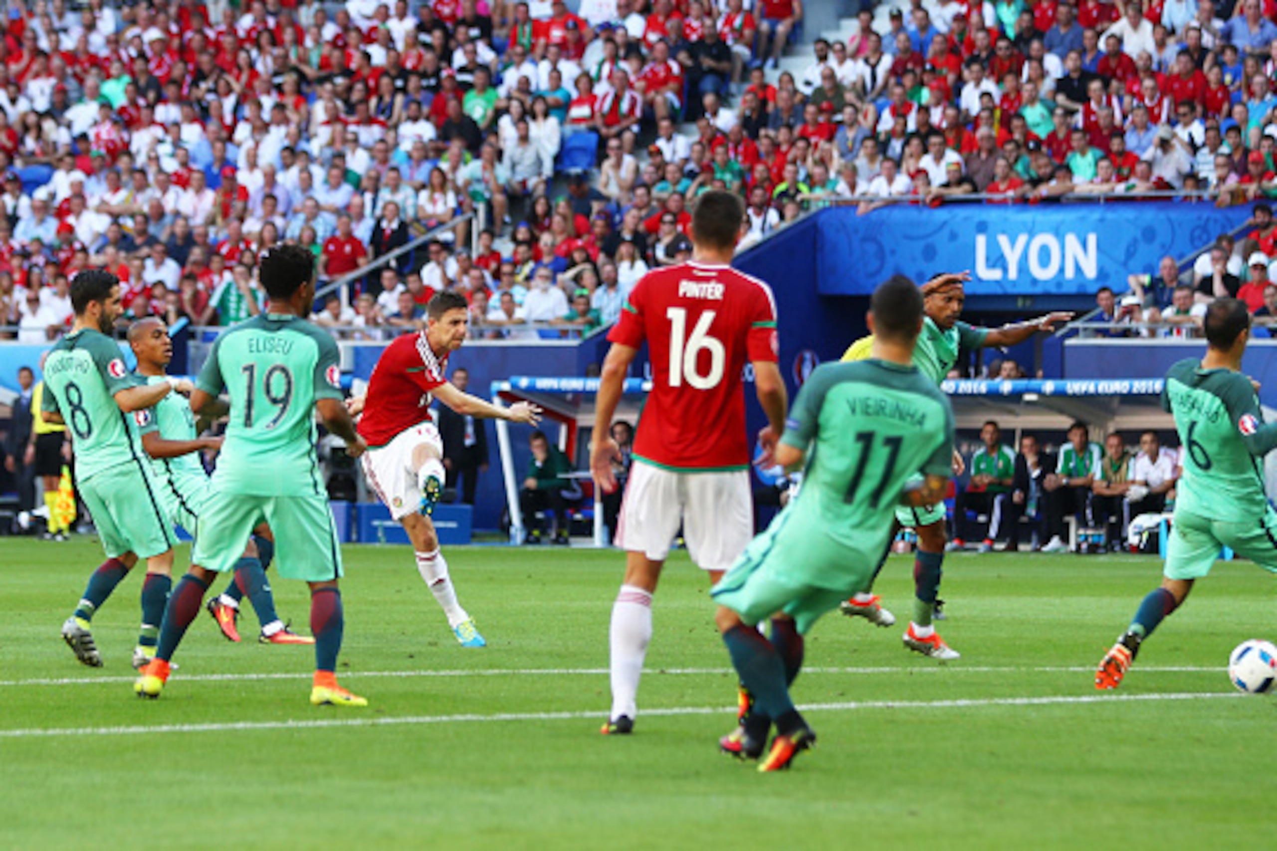 LYON, FRANCE - JUNE 22:  Zoltan Gera (4th R) of Hungary scores the opening goal during the UEFA EURO 2016 Group F match between Hungary and Portugal at Stade des Lumieres on June 22, 2016 in Lyon, France.  (Photo by Michael Steele/Getty Images)