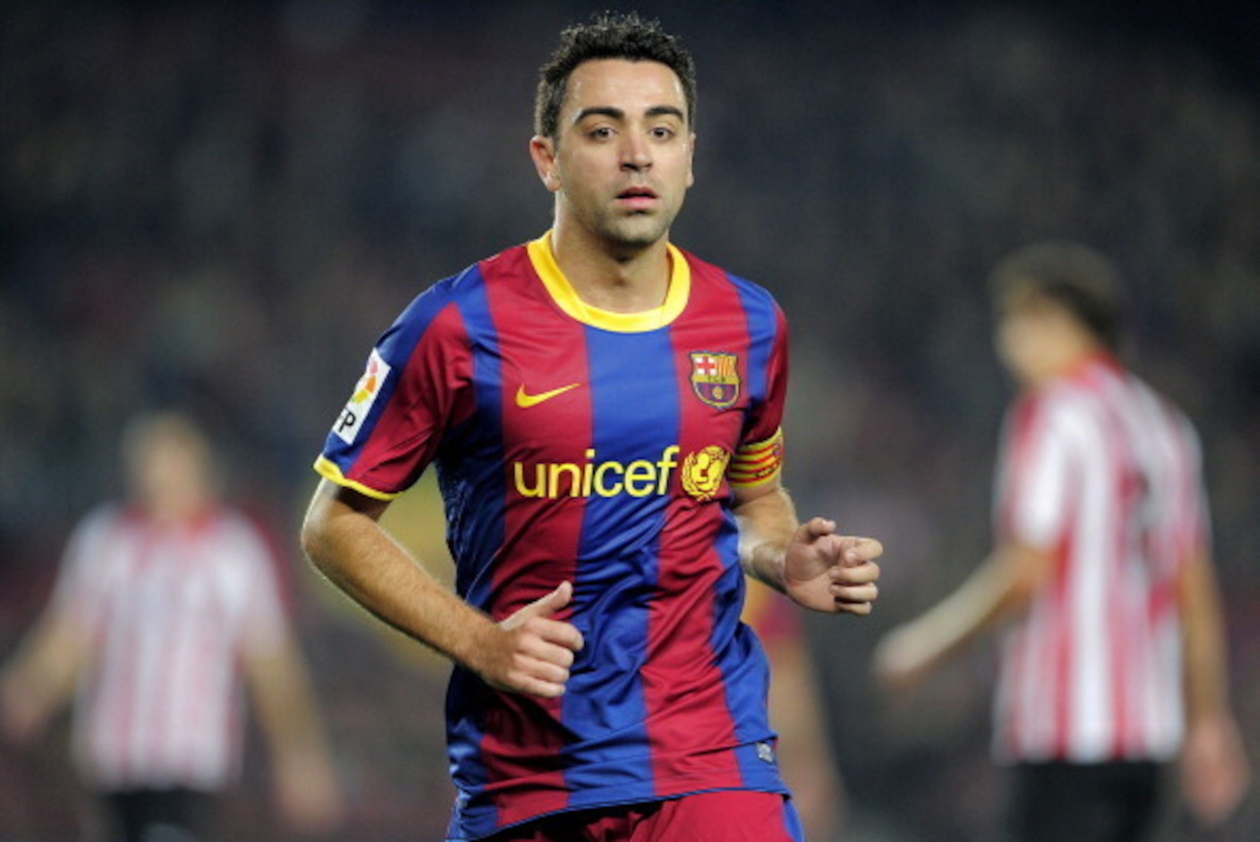 Barcelona's midfielder Xavi Hernandez gestures during the Spanish King's Cup (Copa del Rey) football match Barcelona FC vs Athletic Bilbao on December 21, 2010 at the Camp Nou stadium in Barcelona.    AFP PHOTO/ JOSEP LAGO (Photo credit should read JOSEP 