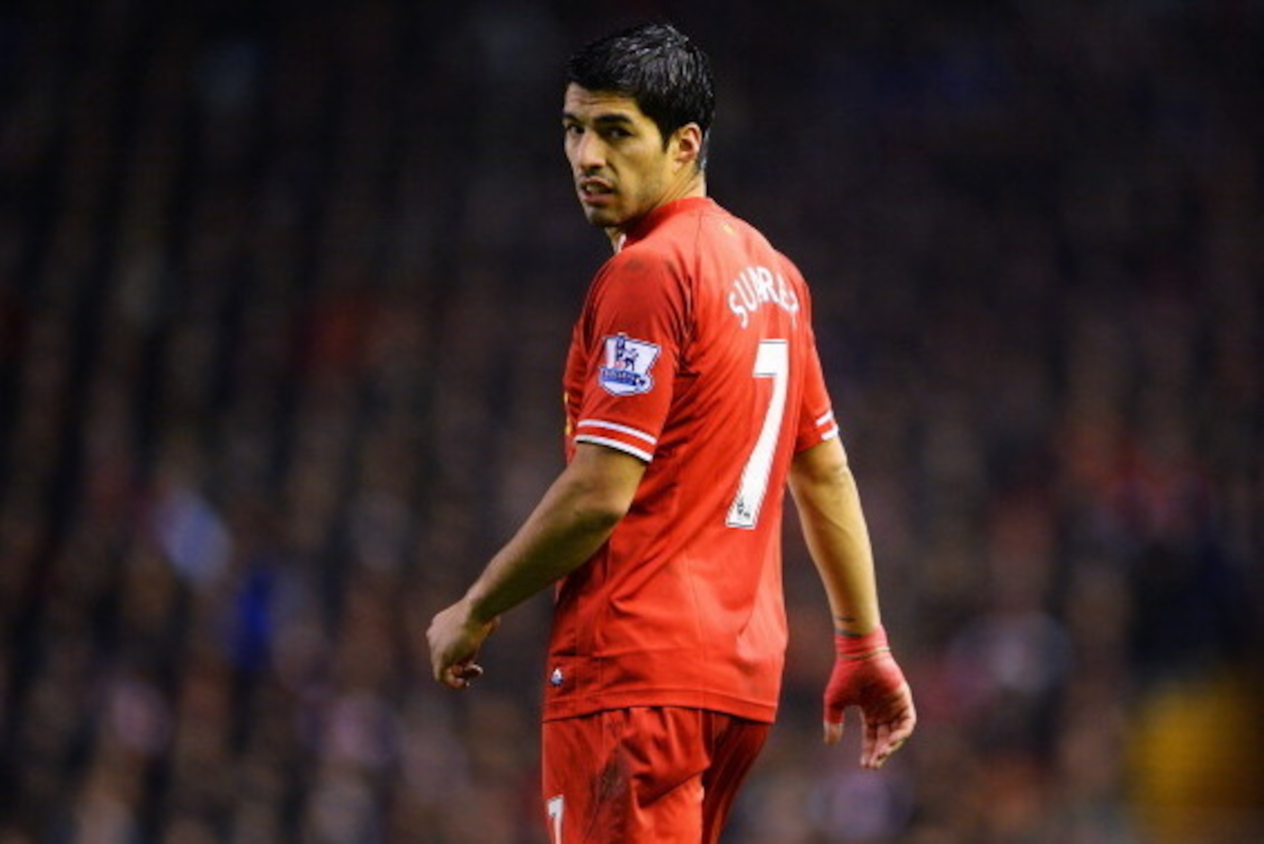 LIVERPOOL, ENGLAND - JANUARY 18:  Luis Suarez of Liverpool looks on during the Barclays Premier League match between Liverpool and Aston Villa at Anfield on January 18, 2014 in Liverpool, England.  (Photo by Michael Regan/Getty Images)