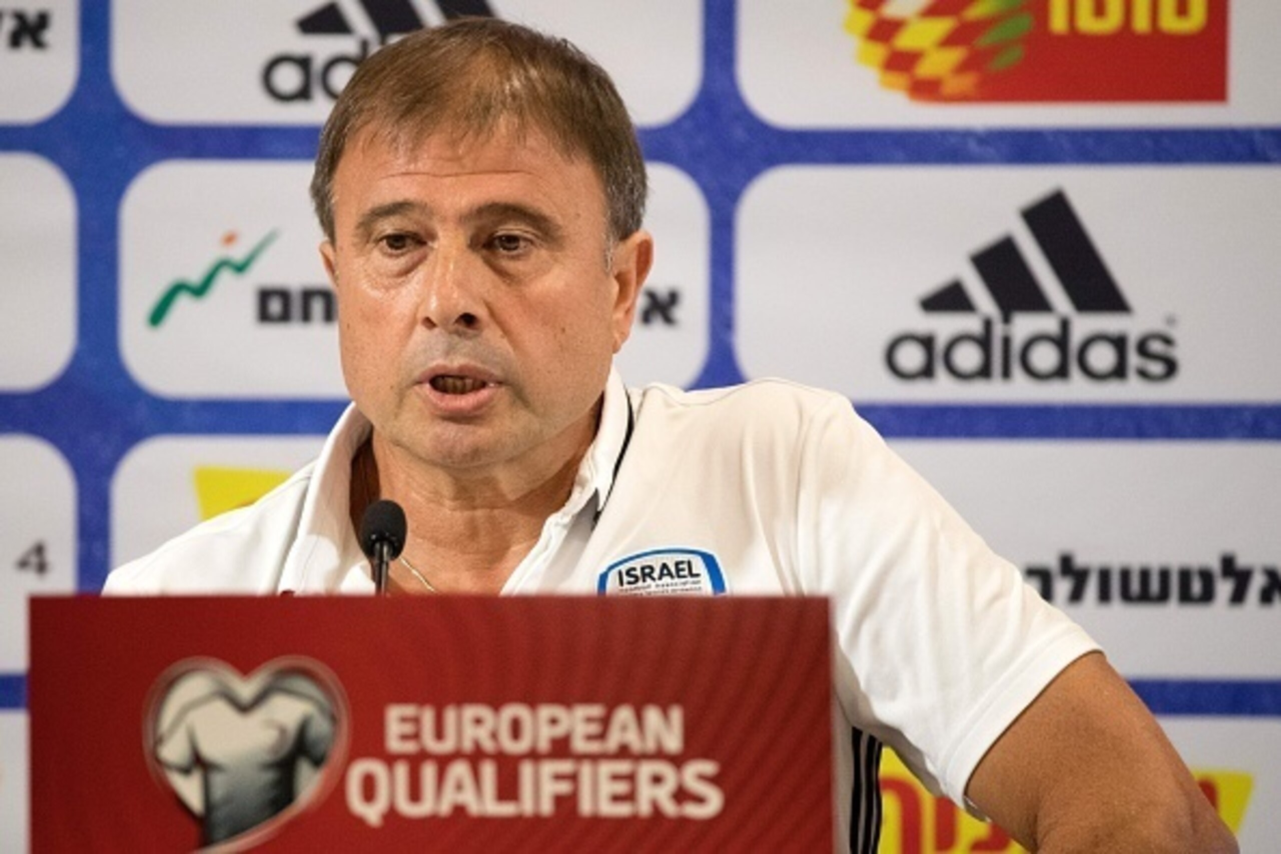 Israeli national football team's head coach, Elisha Levy speaks during a press conference, on September 4, 2016 at Sammy Ofer Stadium in Haifa, in northern Israel, on the eve of their FIFA World Cup 2018 European (group G) qualifying match against Italy. 