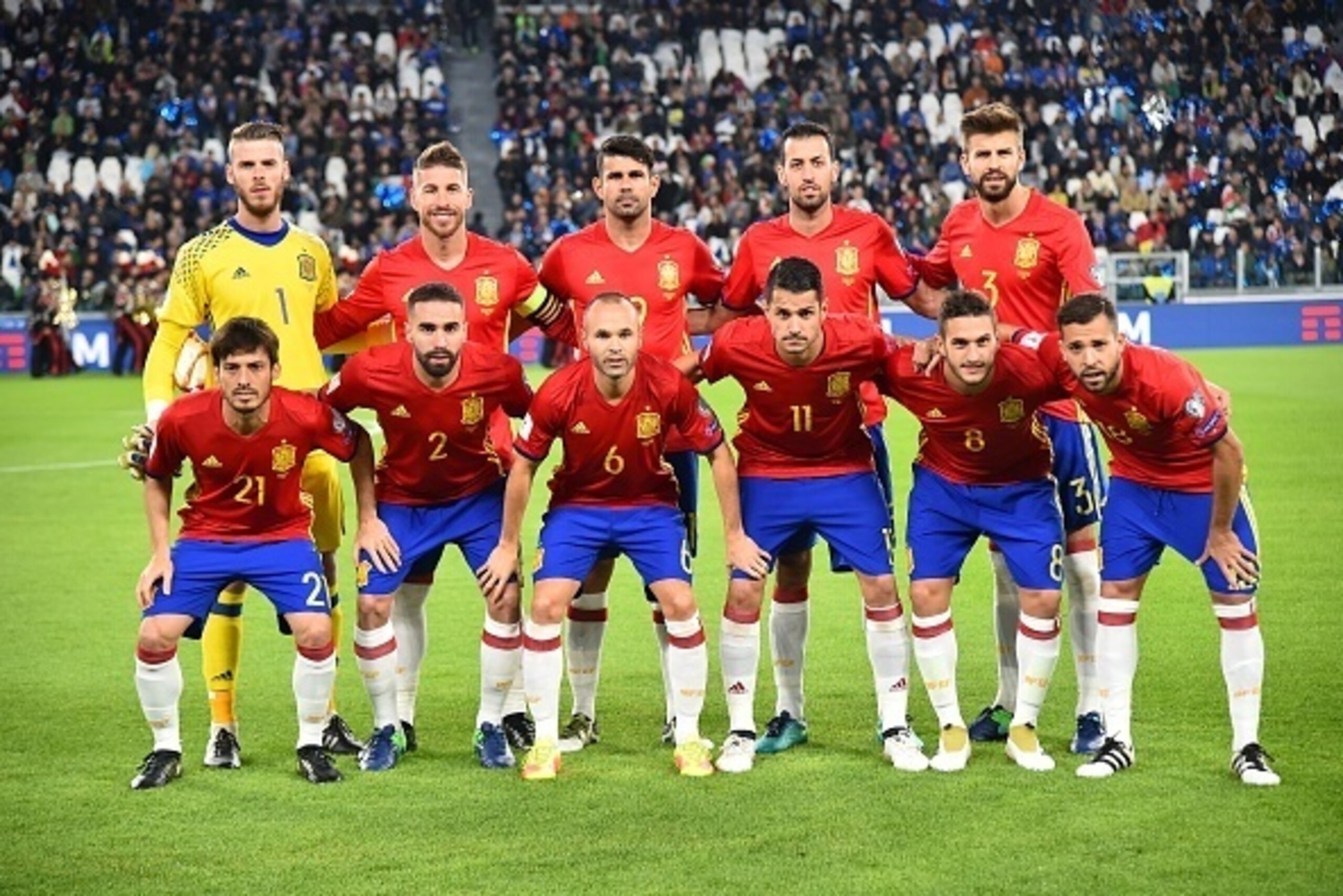 Spain's team players (from top left) Spain's goalkeeper David de Gea, Spain's defender Sergio Ramos, Spain's forward Diego Costa, Spain's midfielder Sergio Busquets, Spain's defender Gerard Pique, Spain's midfielder David Silva, Spain's defender Dani Carv