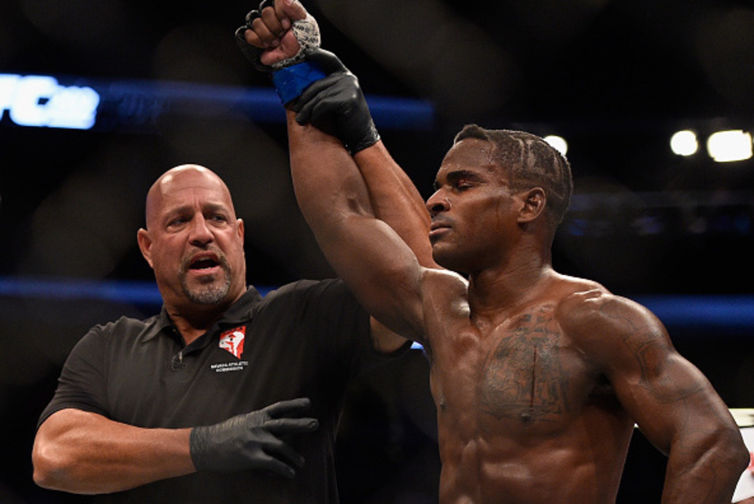 LAS VEGAS, NV - AUGUST 20:  Lorenz Larkin celebrates after defeating Neil Magny in their welterweight bout during the UFC 202 event at T-Mobile Arena on August 20, 2016 in Las Vegas, Nevada.  (Photo by Jeff Bottari/Zuffa LLC/Zuffa LLC via Getty Images)