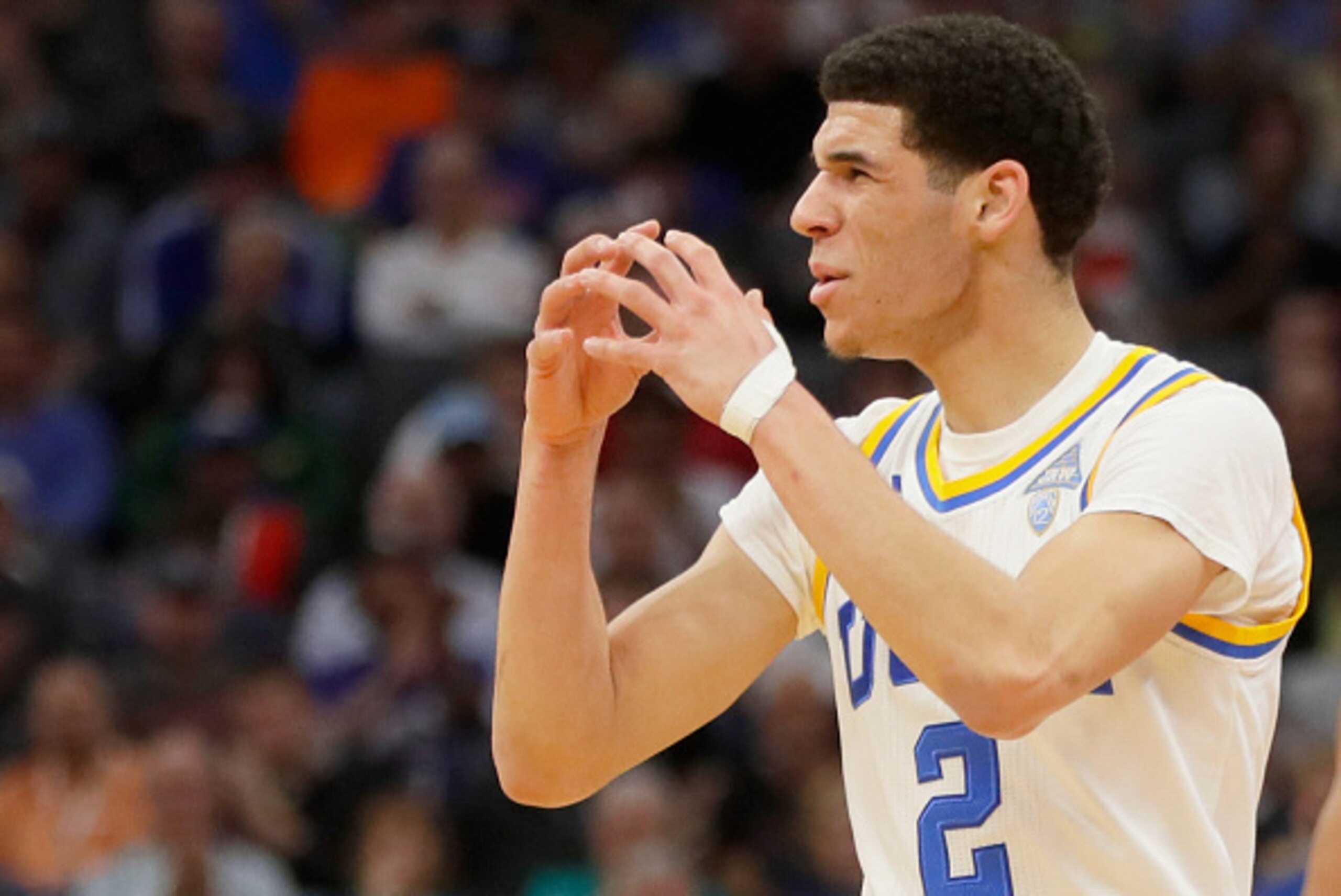 SACRAMENTO, CA - MARCH 19: Lonzo Ball #2 of the UCLA Bruins signals to his team against the Cincinnati Bearcats during the second round of the 2017 NCAA Men's Basketball Tournament at Golden 1 Center on March 19, 2017 in Sacramento, California. (Photo b SACRAMENTO, CA - MARCH 19: Lonzo Ball #2 of the UCLA Bruins signals to his team against the Cincinnati Bearcats during the second round of the 2017 NCAA Men's Basketball Tournament at Golden 1 Center on March 19, 2017 in Sacramento, California. (Photo b