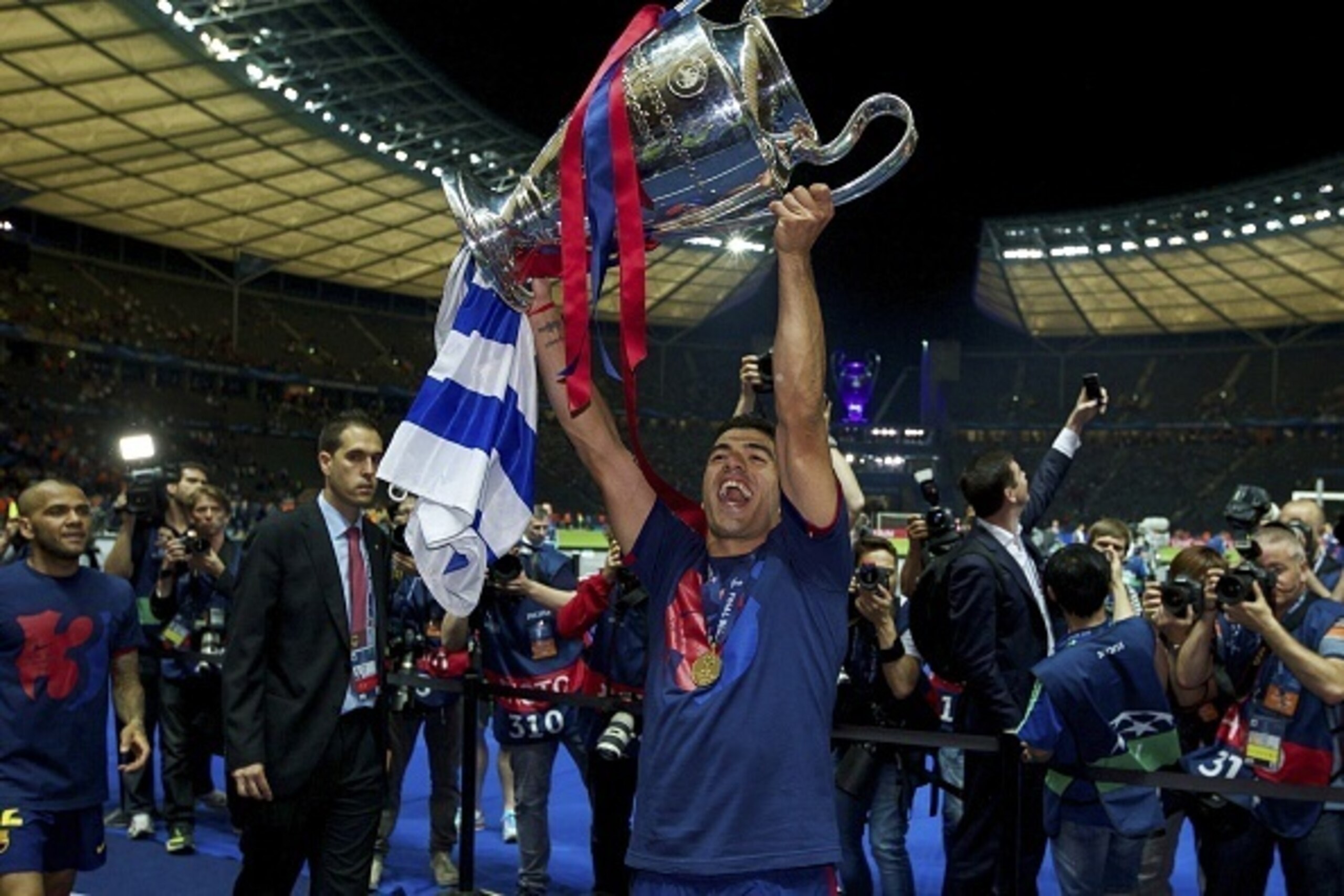 Luis Suarez of FC Barcelona with Champions League trophy during the UEFA Champions League  final match between Barcelona and Juventus on June 6, 2015 at the Olympic stadium in Berlin, Germany.(Photo by VI Images via Getty Images)