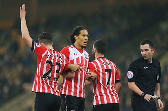 NORWICH, ENGLAND - JANUARY 07: Pierre-Emile Hojbjerg, Virgil van Dijk and Shane Long of Southampton make a wall during the Emirates FA Cup Third Round match between Norwich City and Southampton at Carrow Road on January 7, 2017 in Norwich, England.  (Phot