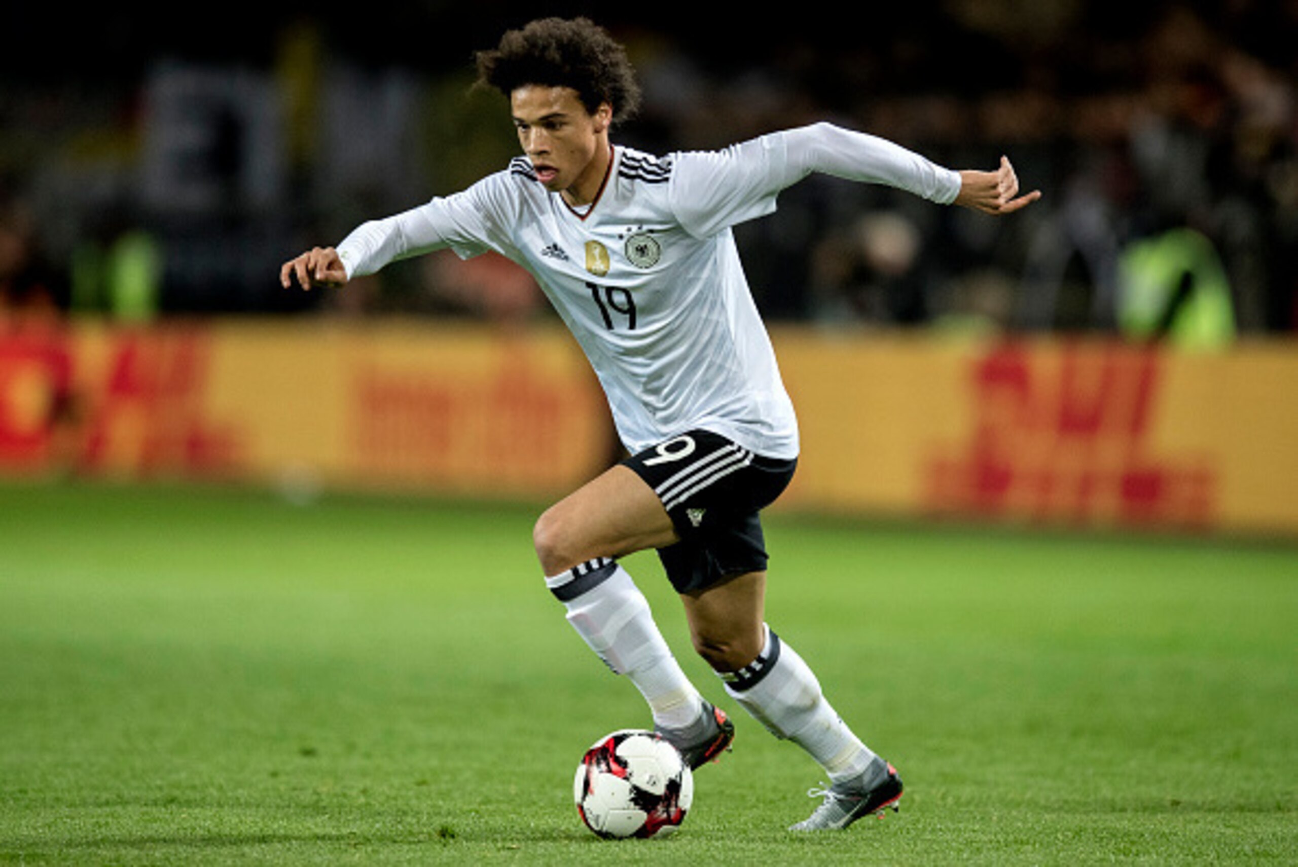 DORTMUND, GERMANY - MARCH 22: Leroy Sane of Germany runs with the ball during the international friendly match between Germany and England at Signal Iduna Park on March 22, 2017 in Dortmund, Germany. (Photo by Boris Streubel/Getty Images) DORTMUND, GERMANY - MARCH 22: Leroy Sane of Germany runs with the ball during the international friendly match between Germany and England at Signal Iduna Park on March 22, 2017 in Dortmund, Germany. (Photo by Boris Streubel/Getty Images)