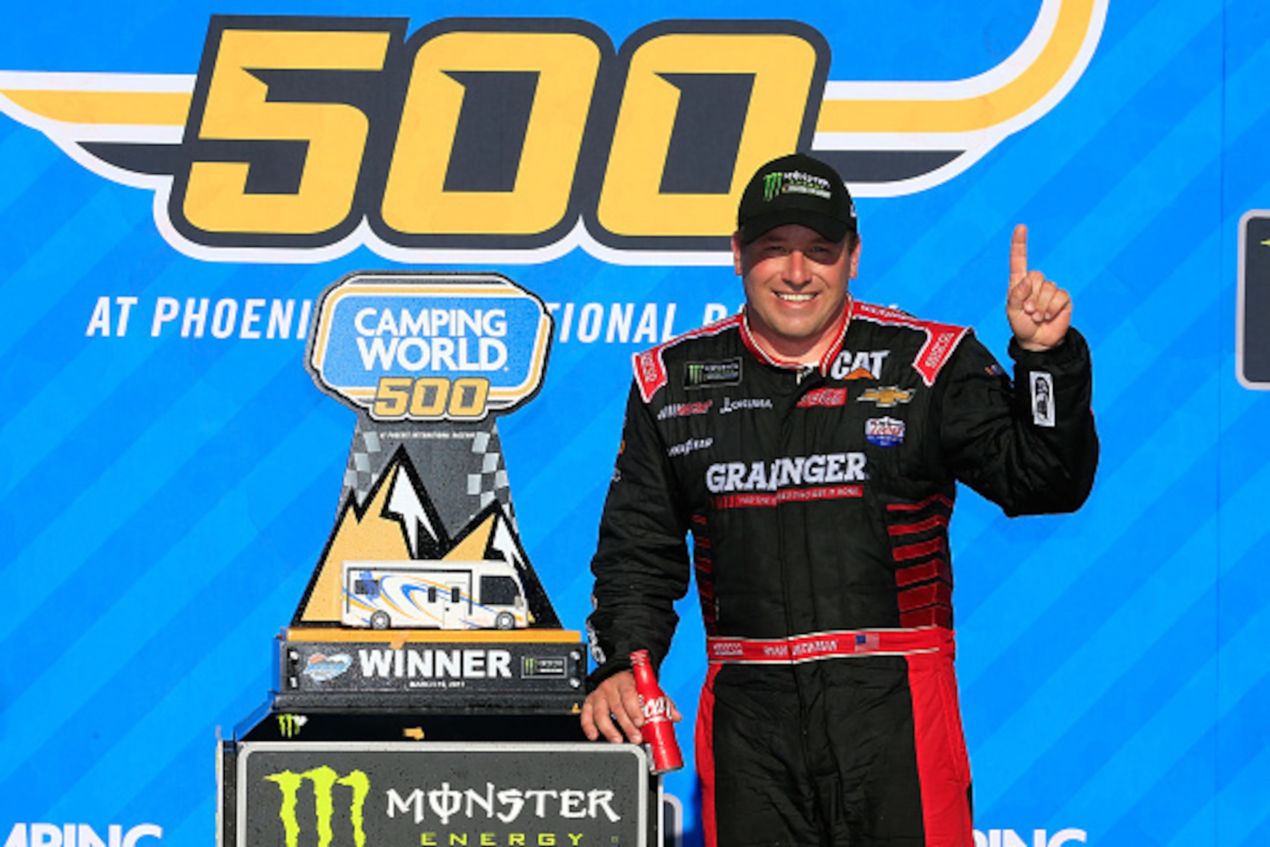 AVONDALE, AZ - MARCH 19:  Ryan Newman, driver of the #31 Grainger Chevrolet, poses with the trophy after winning the Monster Energy NASCAR Cup Series Camping World 500 at Phoenix International Raceway on March 19, 2017 in Avondale, Arizona.  (Photo by Chr