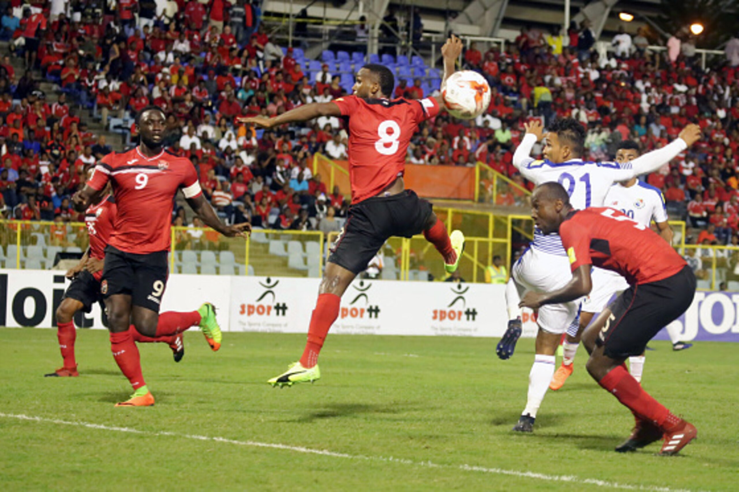 Trinidad and Tobago's Khaleem Hyland (C) jumps for the ball during the 2018 FIFA World Cup qualifier football match against Panama in Port of Spain, Trinidad and Tobago on March 24, 2017. / AFP PHOTO / ALVA VIARRUEL (Photo credit should read ALVA V Trinidad and Tobago's Khaleem Hyland (C) jumps for the ball during the 2018 FIFA World Cup qualifier football match against Panama in Port of Spain, Trinidad and Tobago on March 24, 2017. / AFP PHOTO / ALVA VIARRUEL (Photo credit should read ALVA V