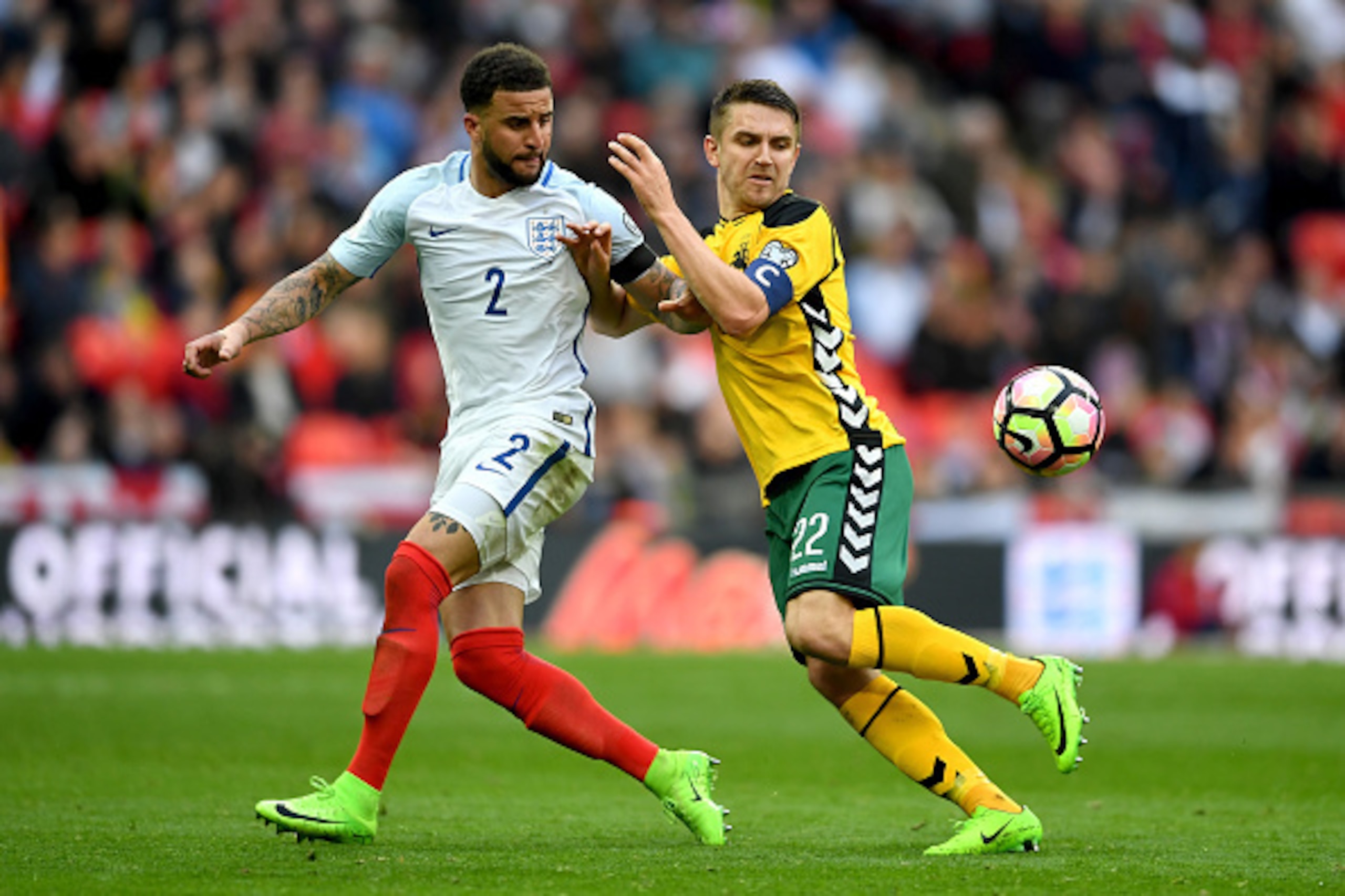LONDON, ENGLAND - MARCH 26:  Kyle Walker of England battles for the ball with Fiodor Cernych of Lithuania during the FIFA 2018 World Cup Qualifier between England and Lithuania at Wembley Stadium on March 26, 2017 in London, England.  (Photo by Laurence G