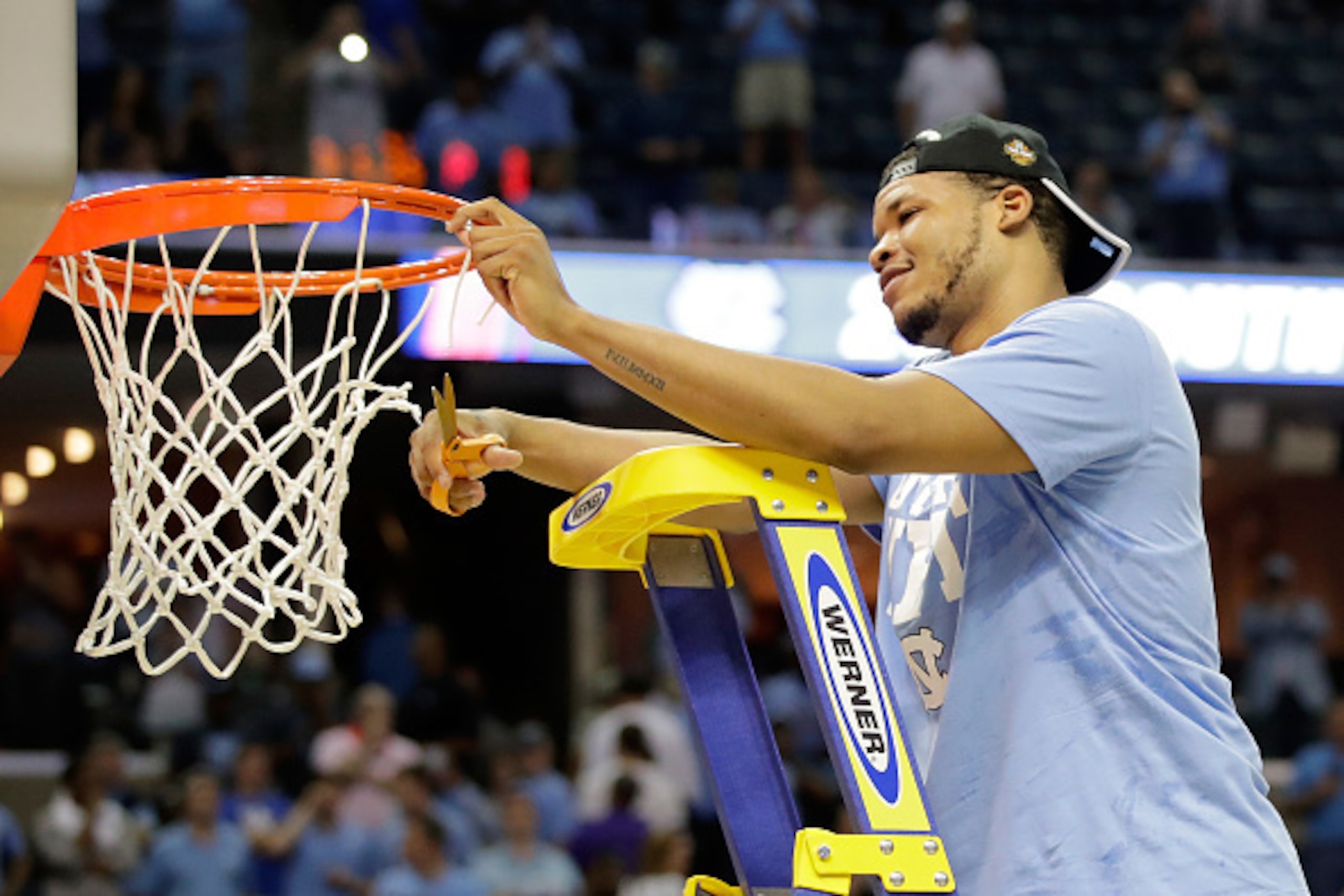 MEMPHIS, TN - MARCH 26: Kennedy Meeks #3 of the North Carolina Tar Heels cuts down the net after defeating the Kentucky Wildcats during the 2017 NCAA Men's Basketball Tournament South Regional at FedExForum on March 26, 2017 in Memphis, Tennessee.  (Photo