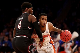NEW YORK, NY - MARCH 26:  Kasey Hill #0 of the Florida Gators drives to the basket against Rakym Felder #4 of the South Carolina Gamecocks in the first half during the 2017 NCAA Men's Basketball Tournament East Regional at Madison Square Garden on March 2
