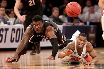 NEW YORK, NY - MARCH 26:  Duane Notice #10 of the South Carolina Gamecocks and Justin Leon #23 of the Florida Gators lose the ball in the second half during the 2017 NCAA Men's Basketball Tournament East Regional at Madison Square Garden on March 26, 2017