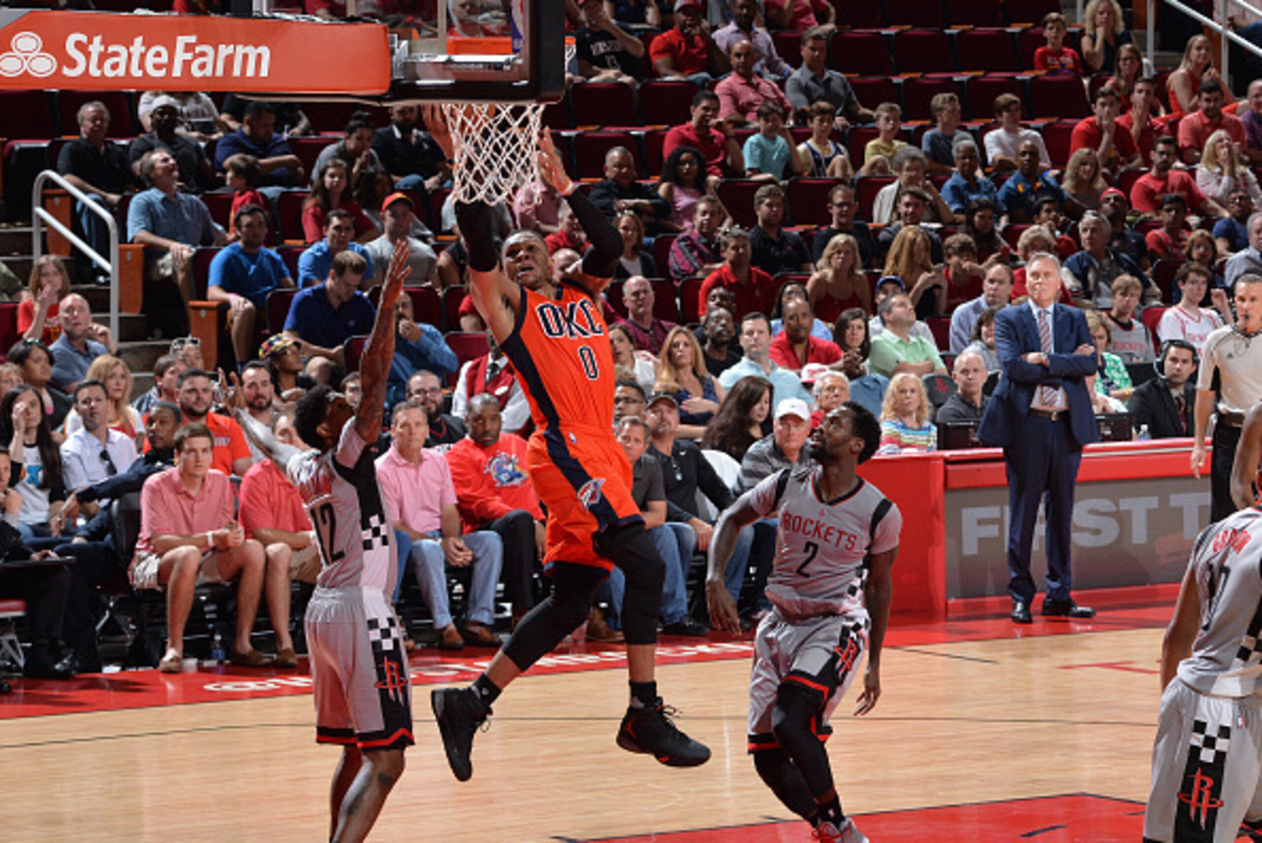 HOUSTON, TX - MARCH 26: Russell Westbrook #0 of the Oklahoma City Thunder goes up for the layup against the Houston Rockets on March 26, 2017 at the Toyota Center in Houston, Texas. NOTE TO USER: User expressly acknowledges and agrees that, by downloading