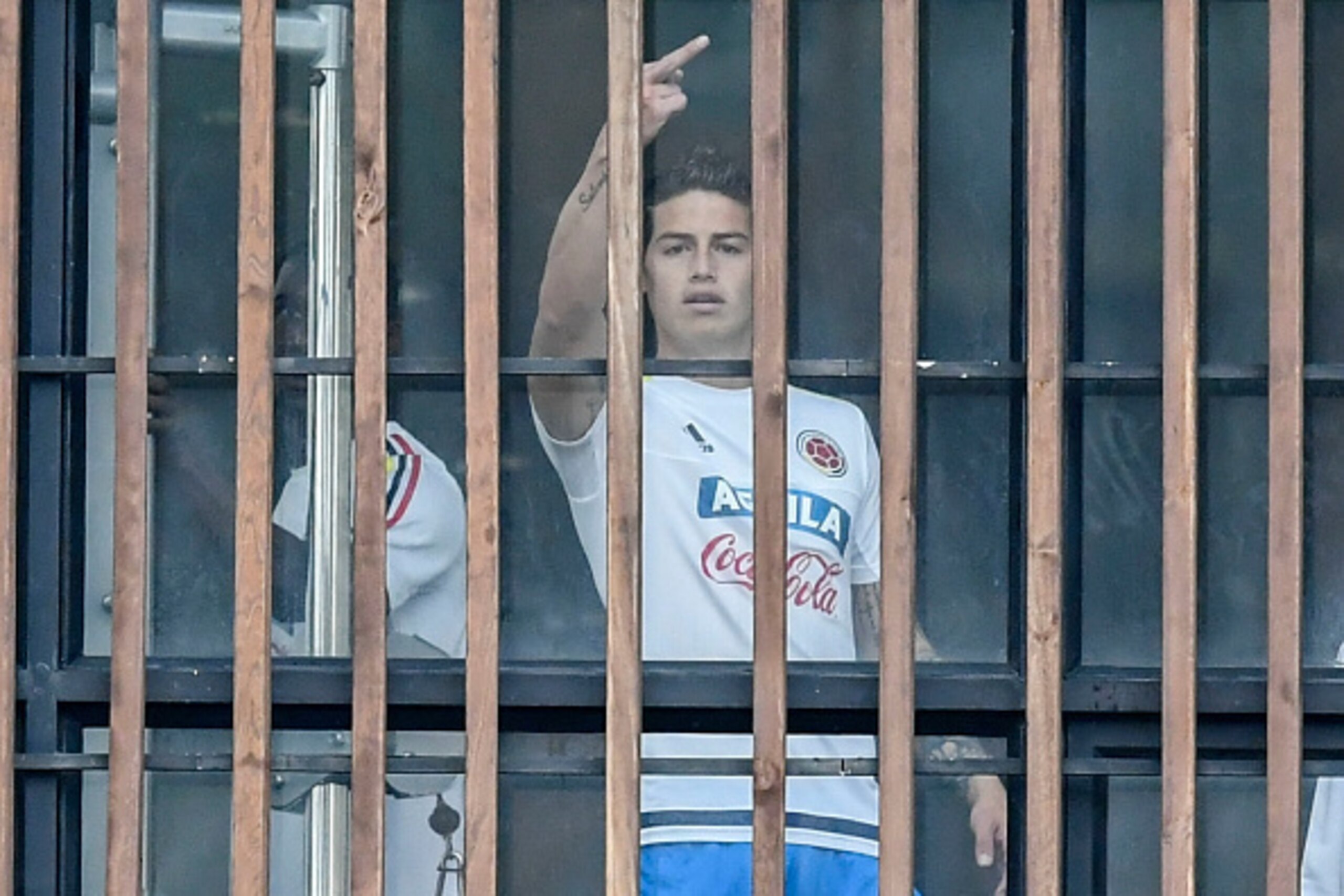 Colombia's midfielder James Rodriguez gestures toward the journalists before a training session at the Colombian football Federation in Bogota on March 25 2017 ahead of their FIFA World Cup South American qualifier football match against Ecuador. / AFP PH Colombia's midfielder James Rodriguez gestures toward the journalists before a training session at the Colombian football Federation in Bogota on March 25 2017 ahead of their FIFA World Cup South American qualifier football match against Ecuador. / AFP PH